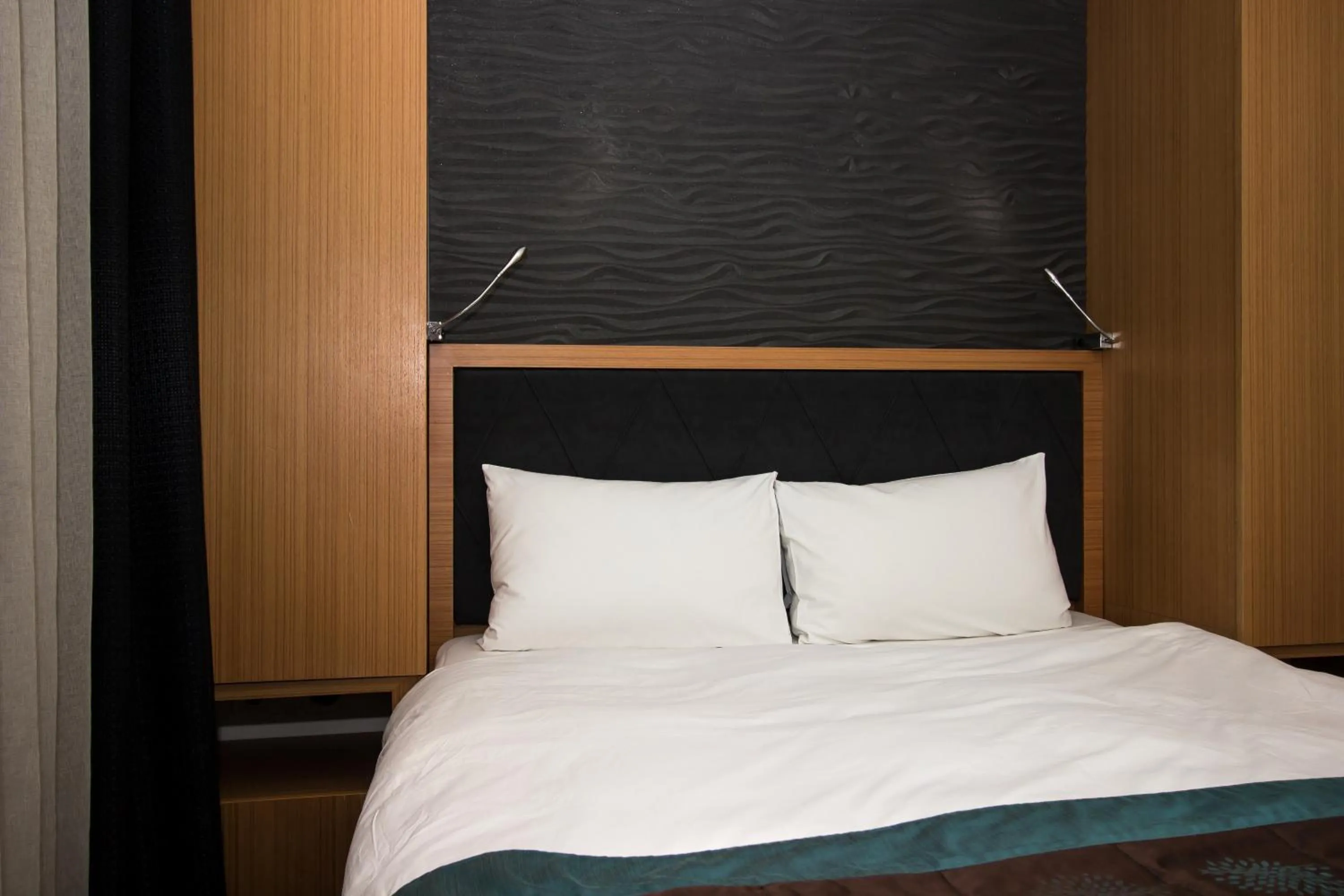 Bed in Le Marde Hotel