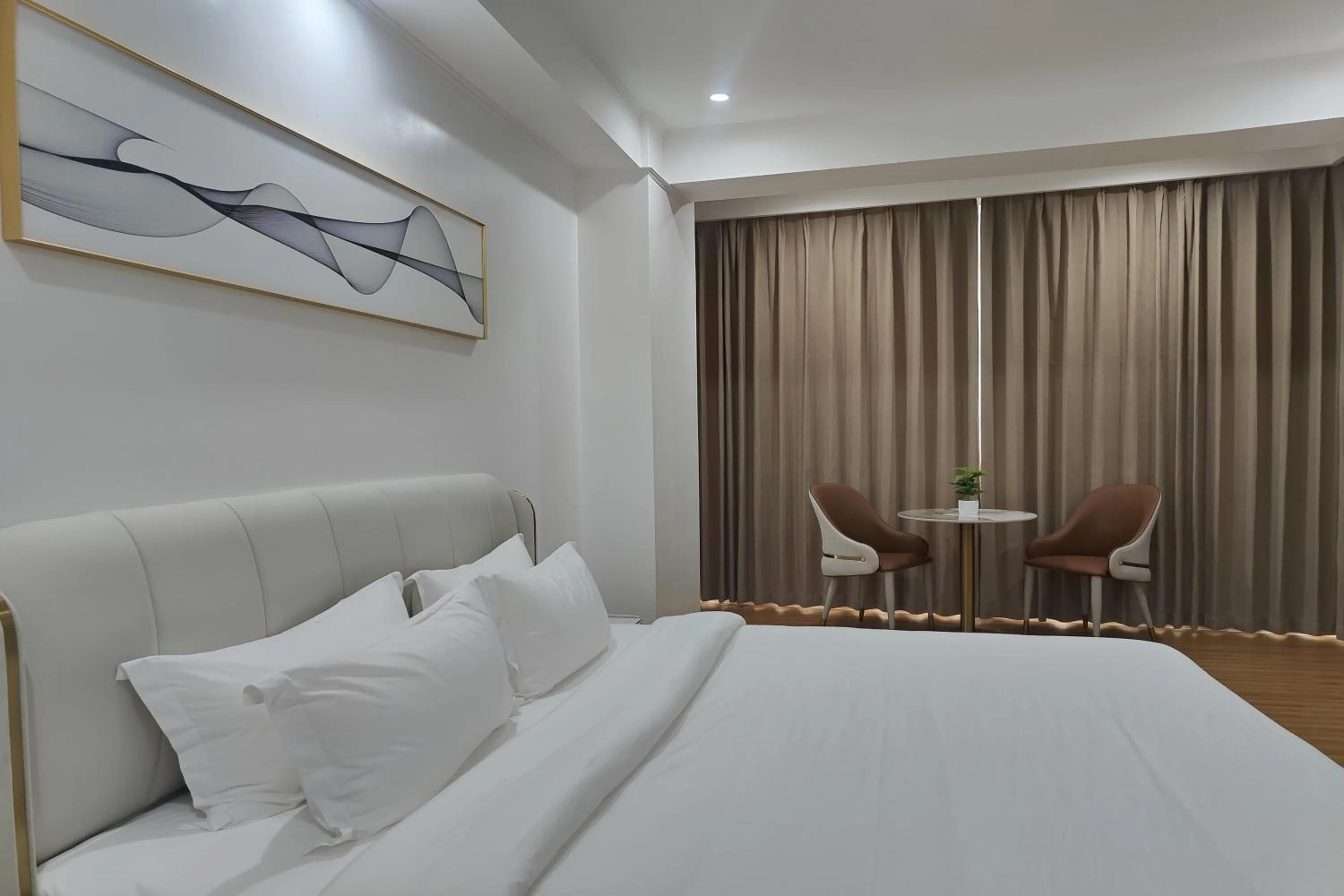 Bed in Mactan Grand Golden Hotel near Airport