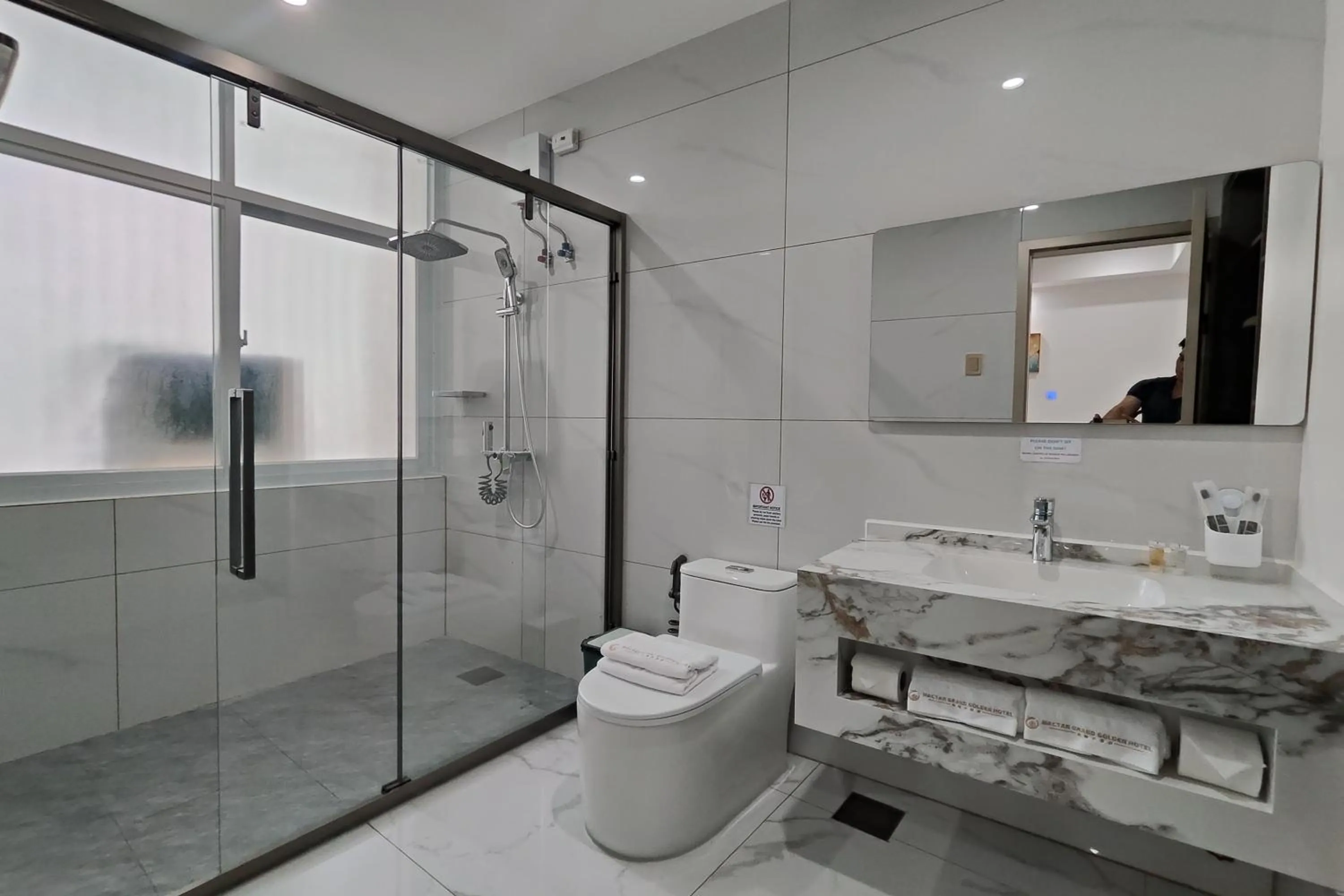 Bathroom in Mactan Grand Golden Hotel near Airport