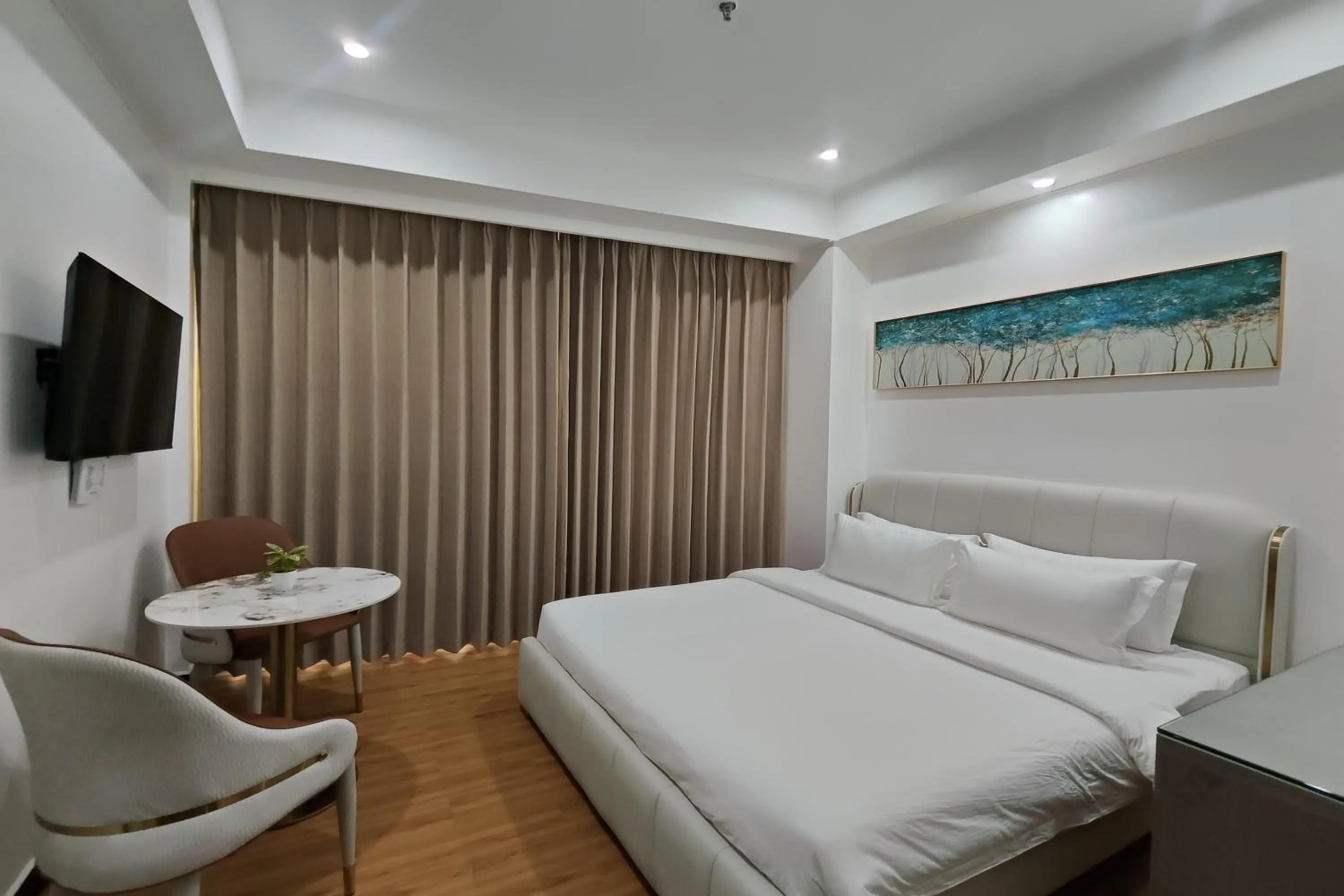 Bed in Mactan Grand Golden Hotel near Airport