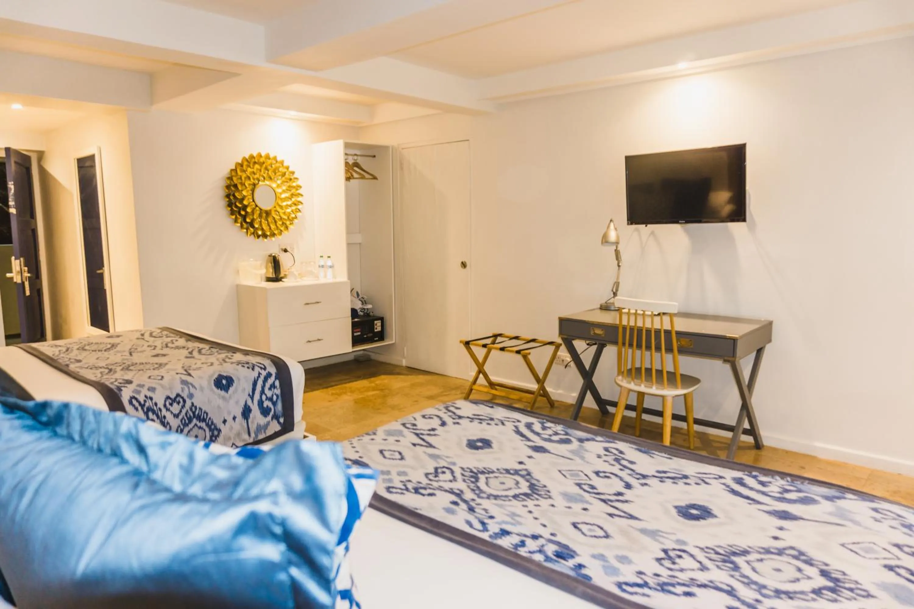 Living room, Bed in Blue Lagoon Hotel and Marina Ltd