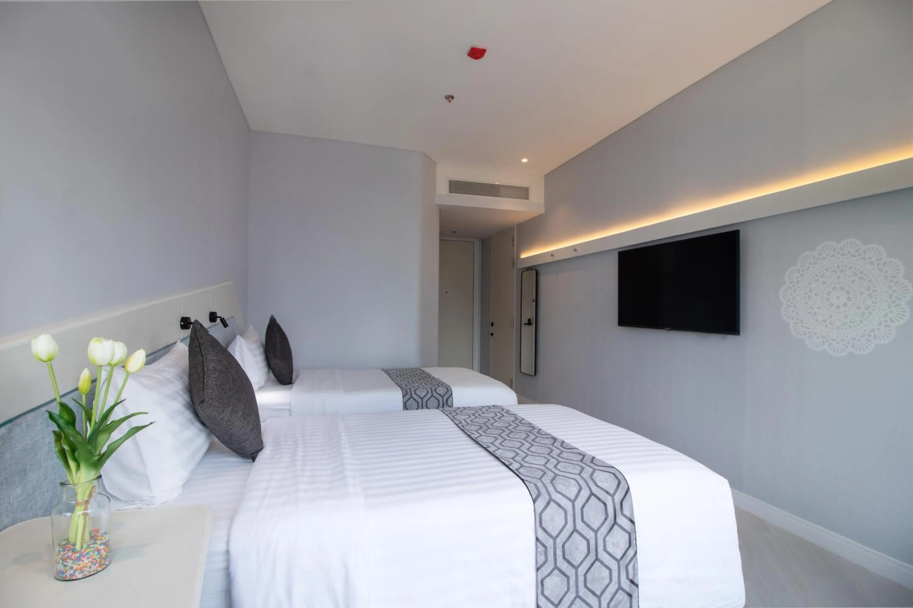 Bed in Queensland Hotel Bangkok