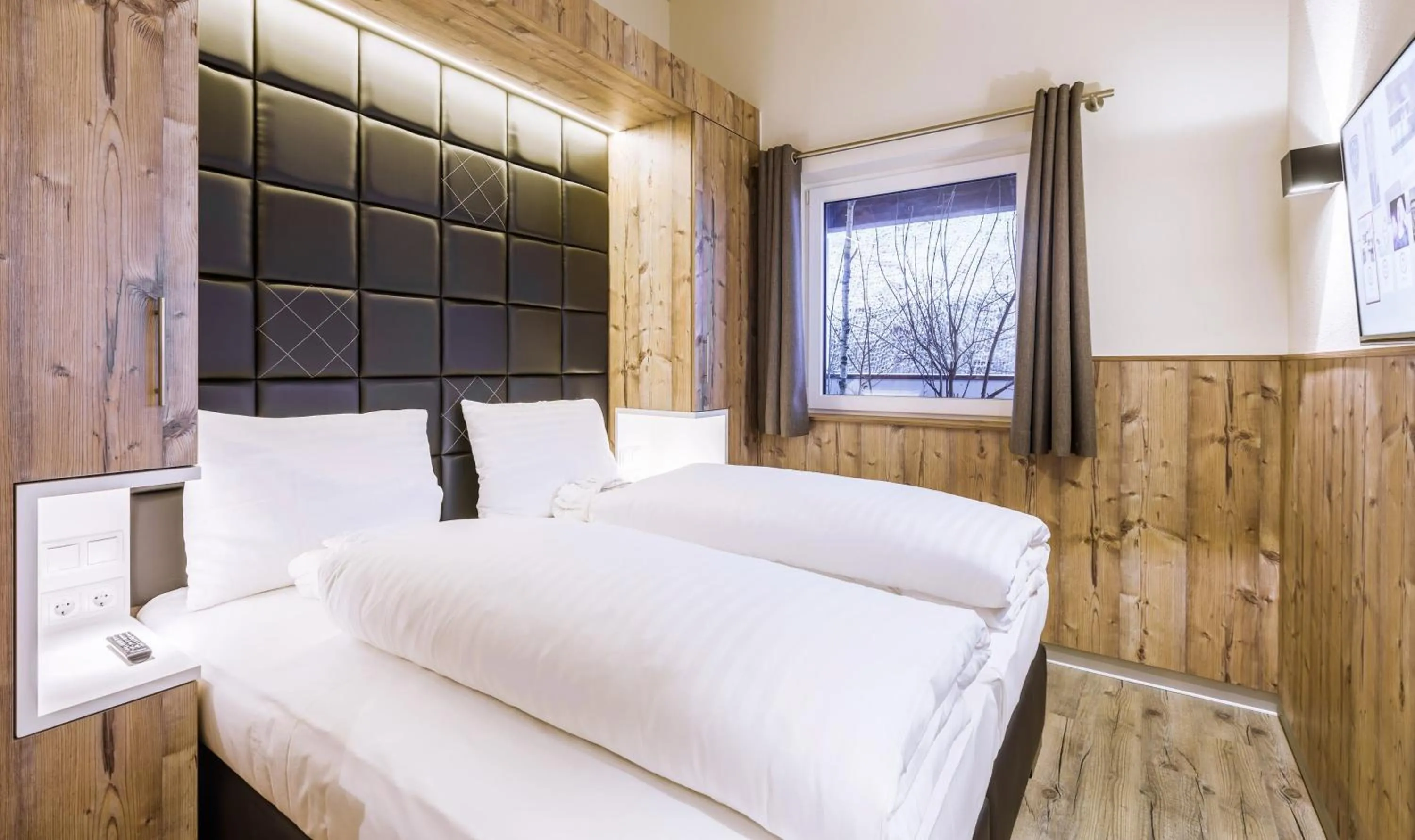 Bedroom, Bed in AvenidA Mountain Lodges Saalbach