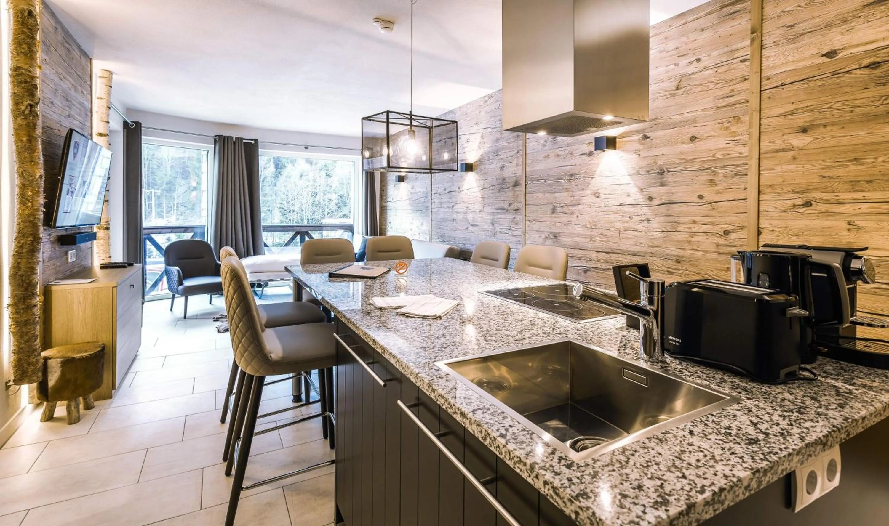 Kitchen or kitchenette in AvenidA Mountain Lodges Saalbach