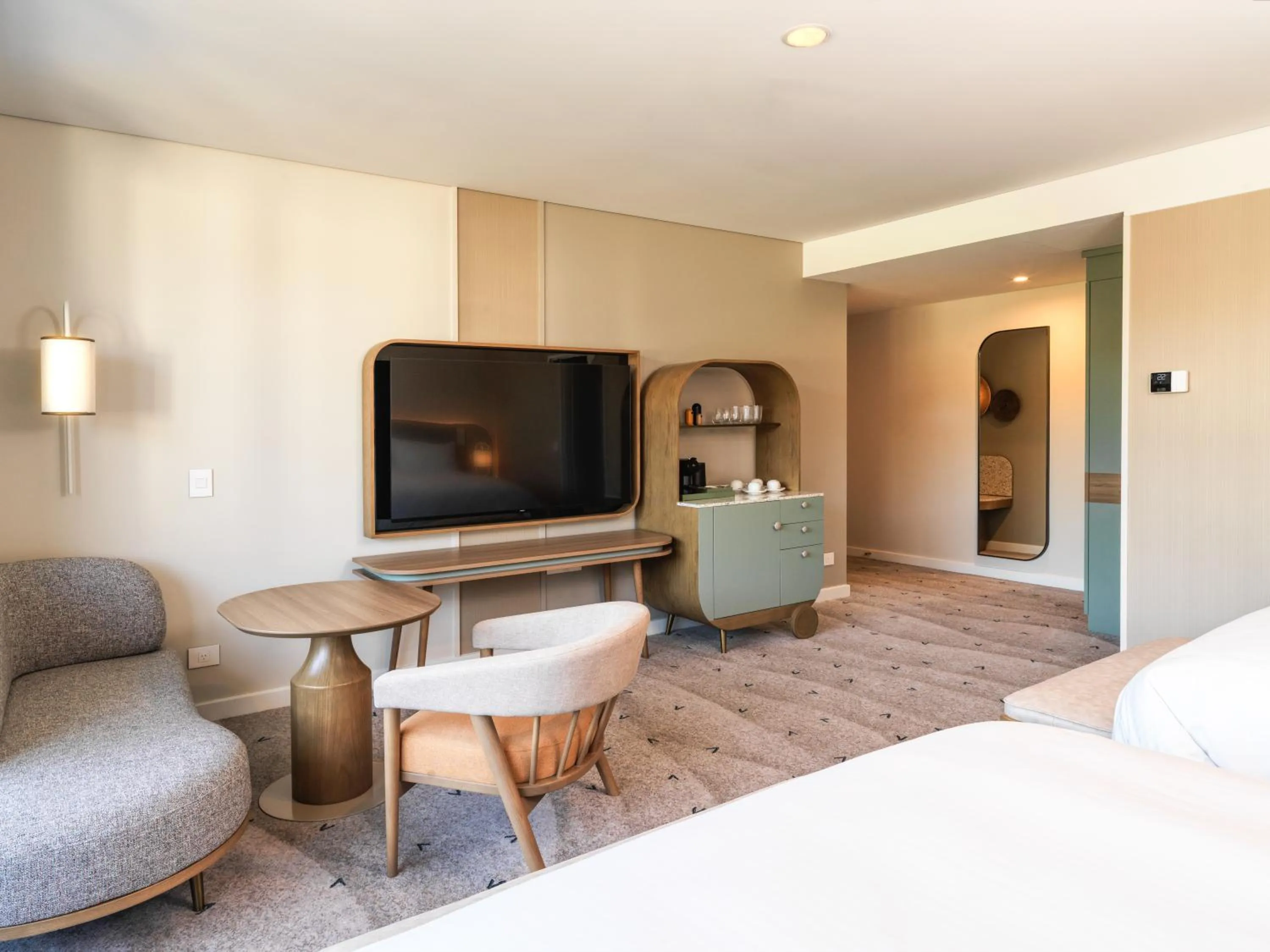 Living room, Bed in voco Gosford by IHG