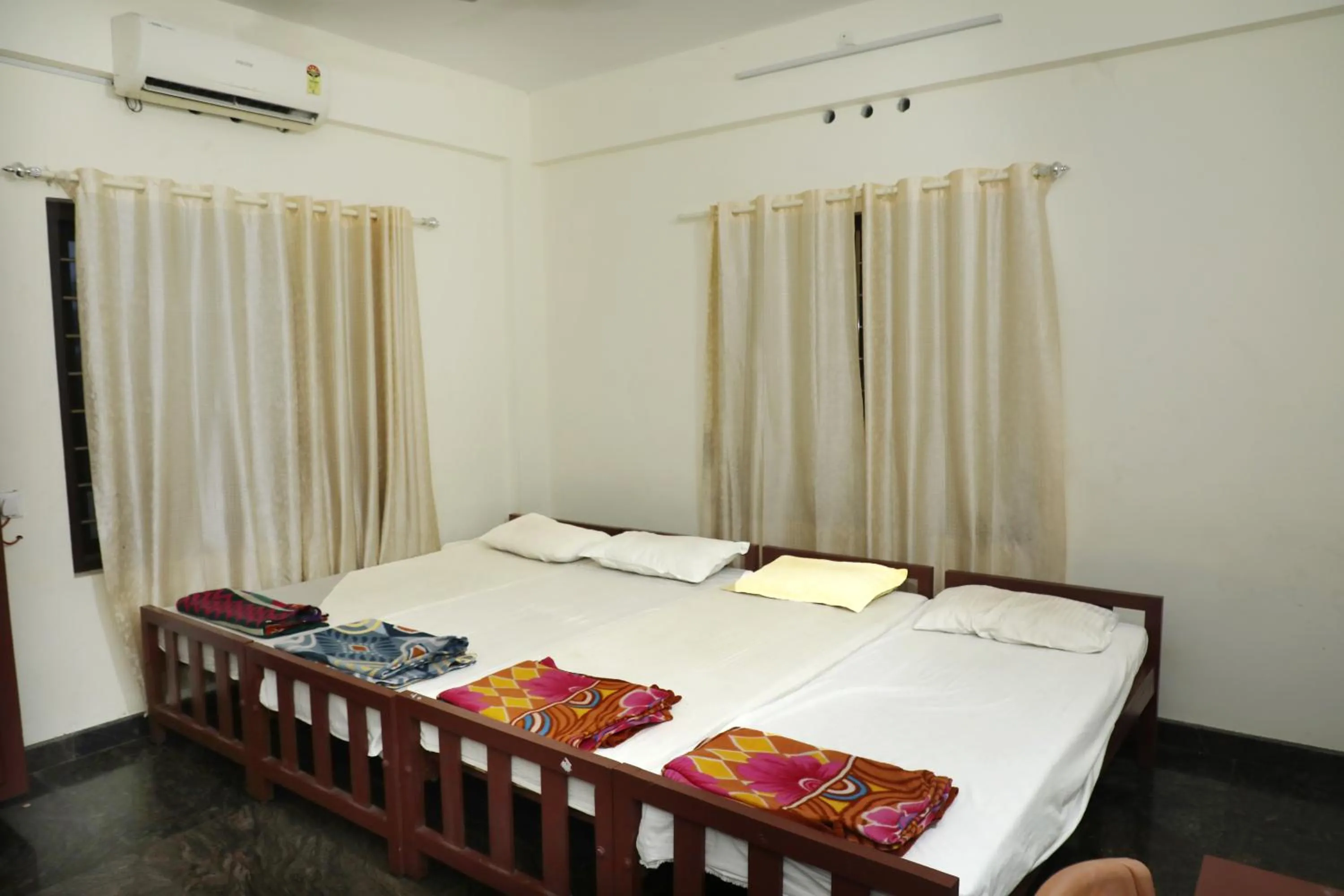 Bedroom, Bed in Sauhrudam Resort and Restaurant-Kanyakumari