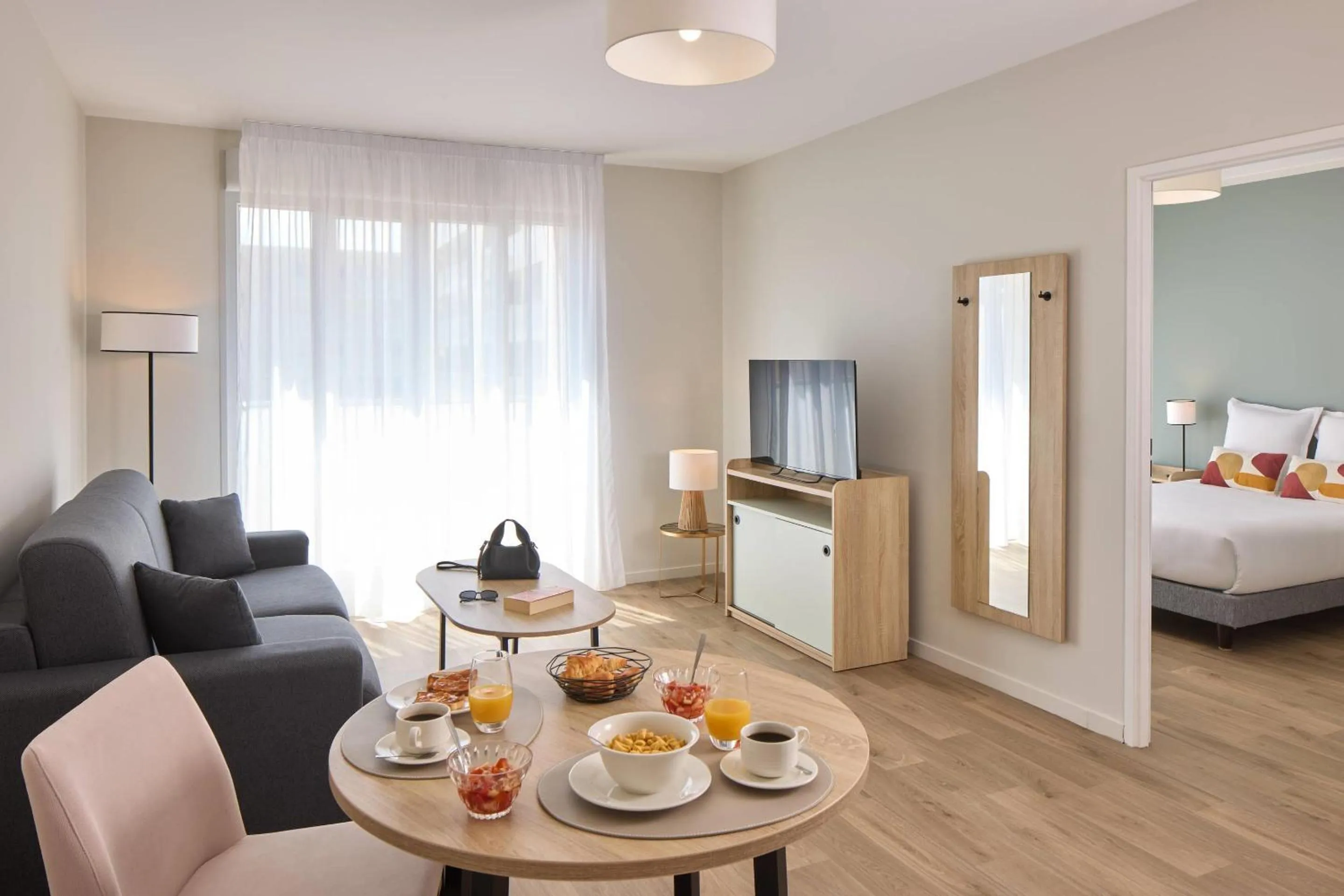 Bedroom, Bed in Zenitude Quality Aparthotel Reims - Saint-Thomas