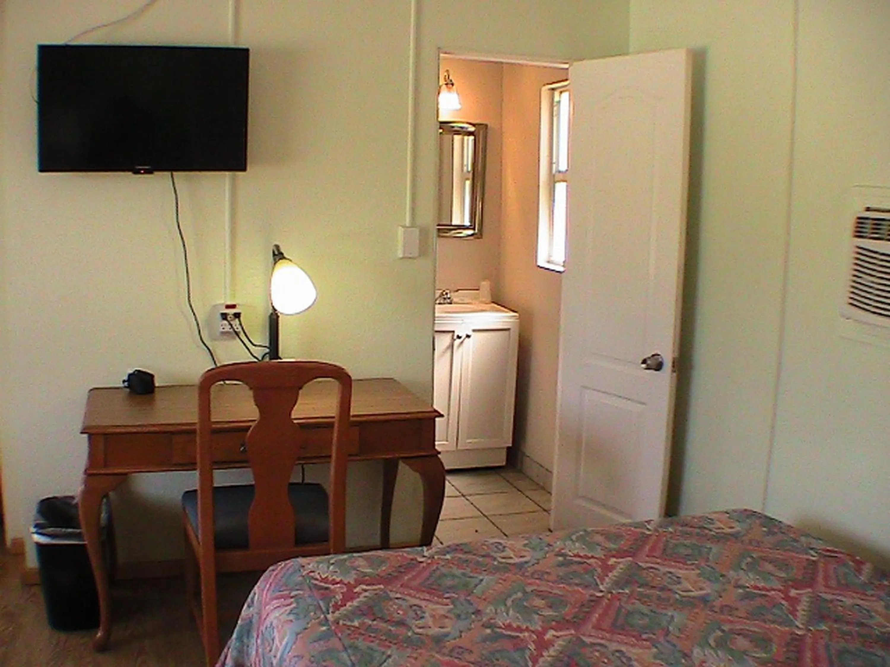 Photo of the whole room, Bed in At Home Express Tangerine Inn