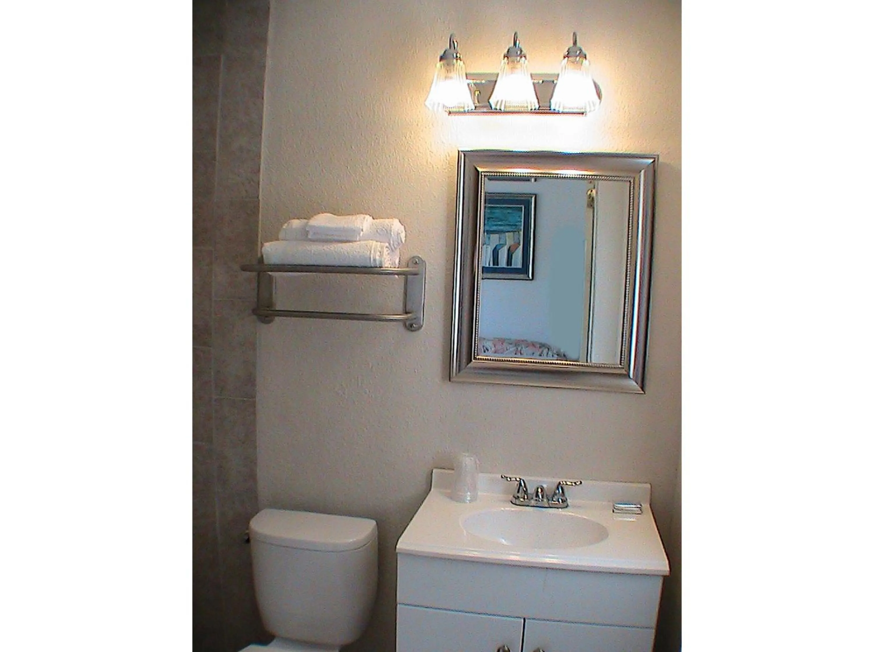 Bathroom in At Home Express Tangerine Inn