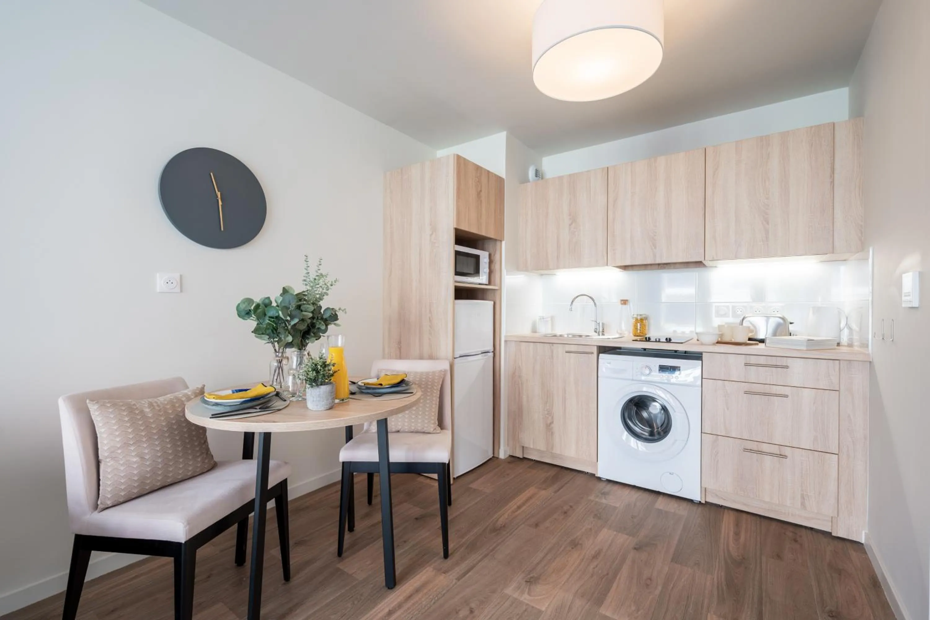 Kitchen or kitchenette in Zenao Appart'hôtels Villeneuve d'Ascq