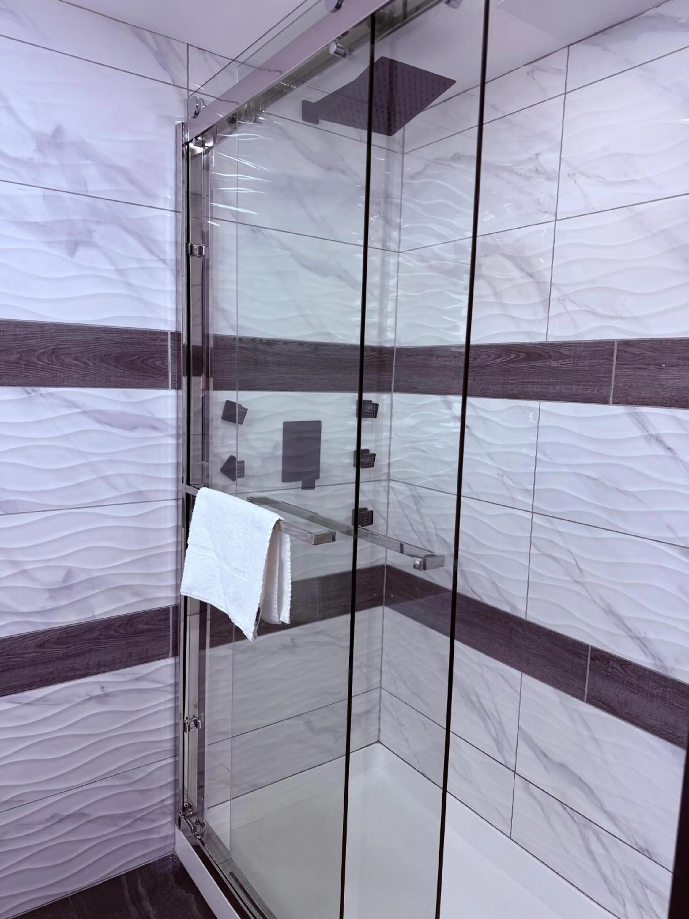 Shower in The Vine Hotel Bronx New