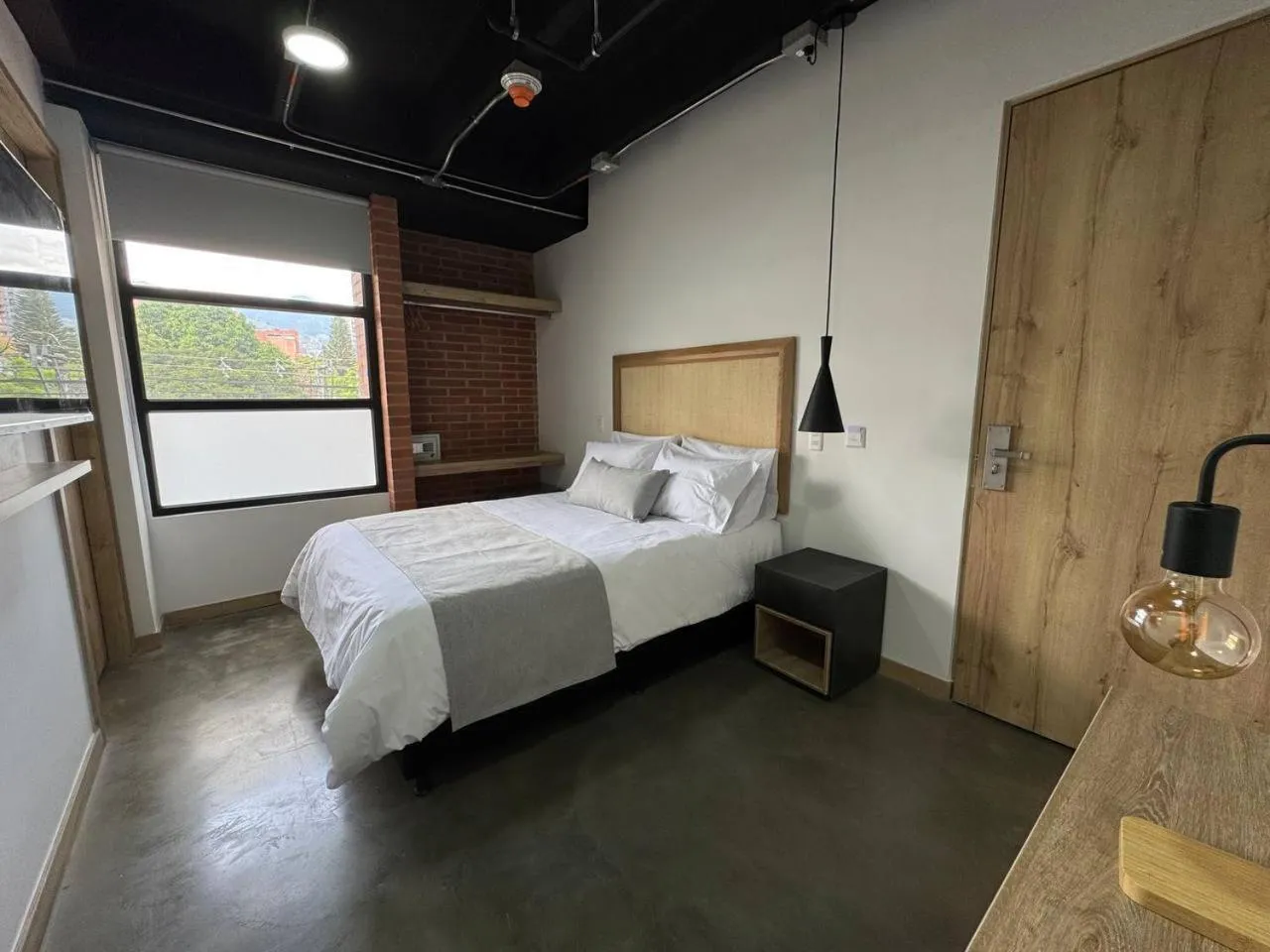 Bed in Akela Park Hotel