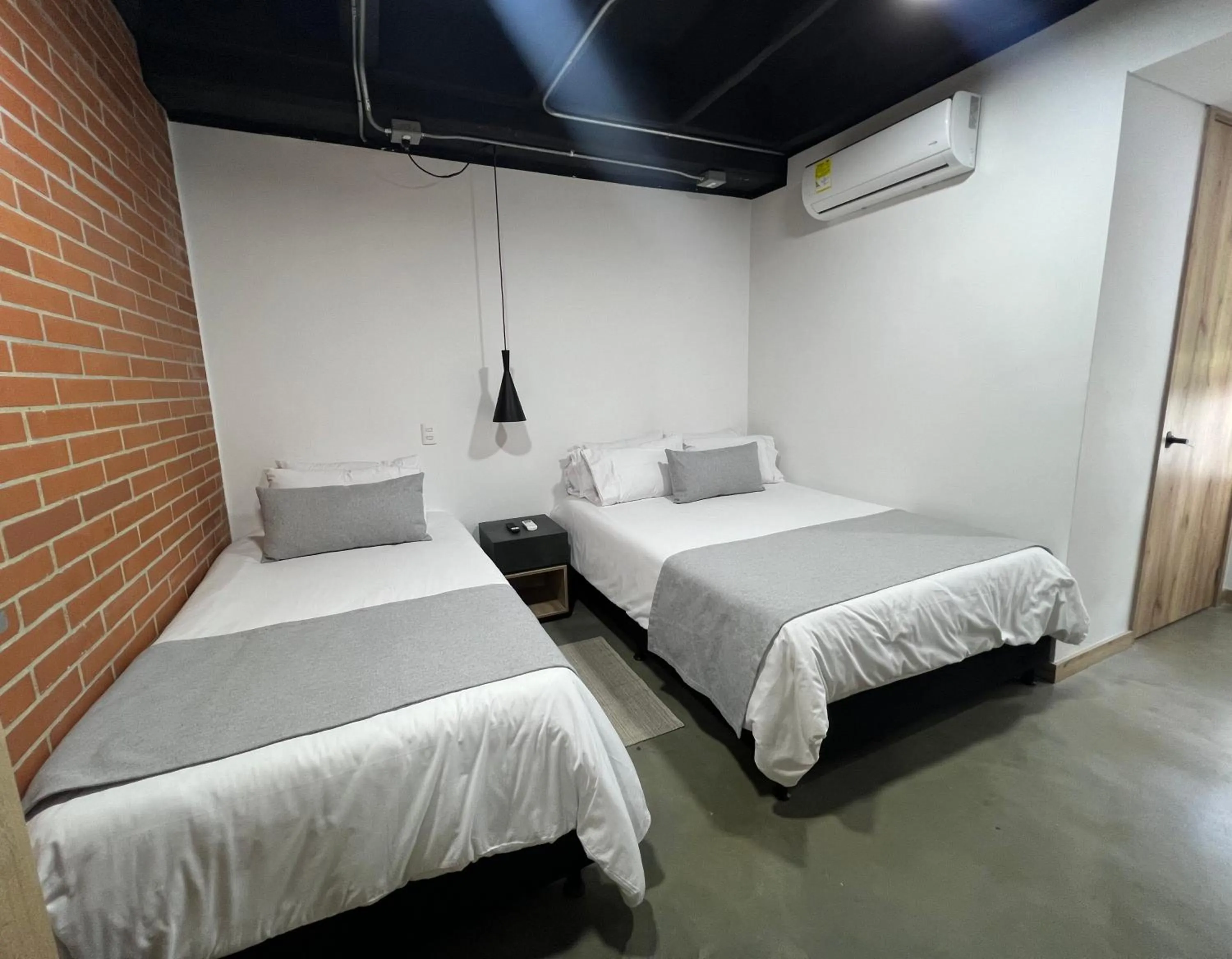 Bed in Akela Park Hotel