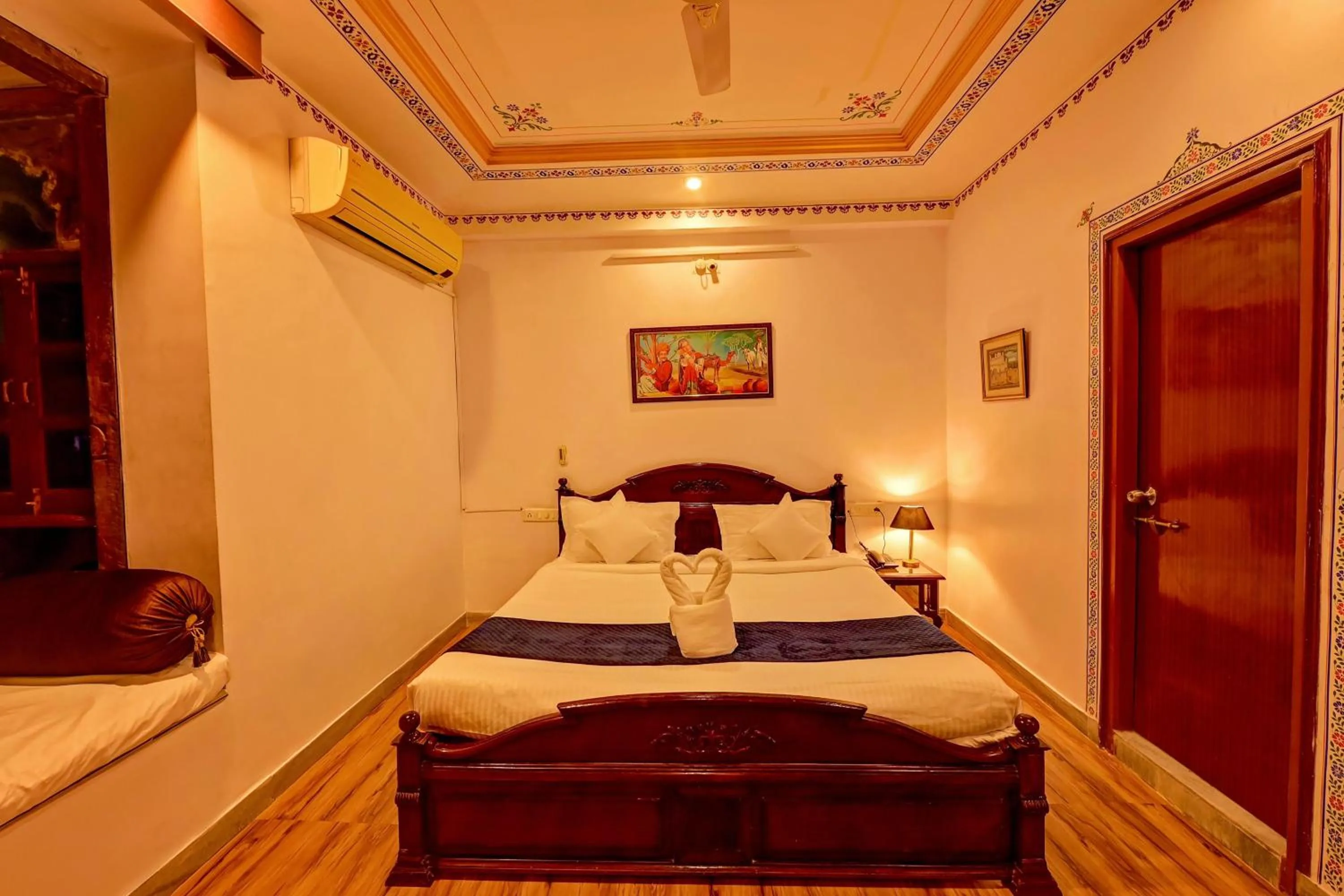 Bed in Elysium Retreat- The Heritage Haveli