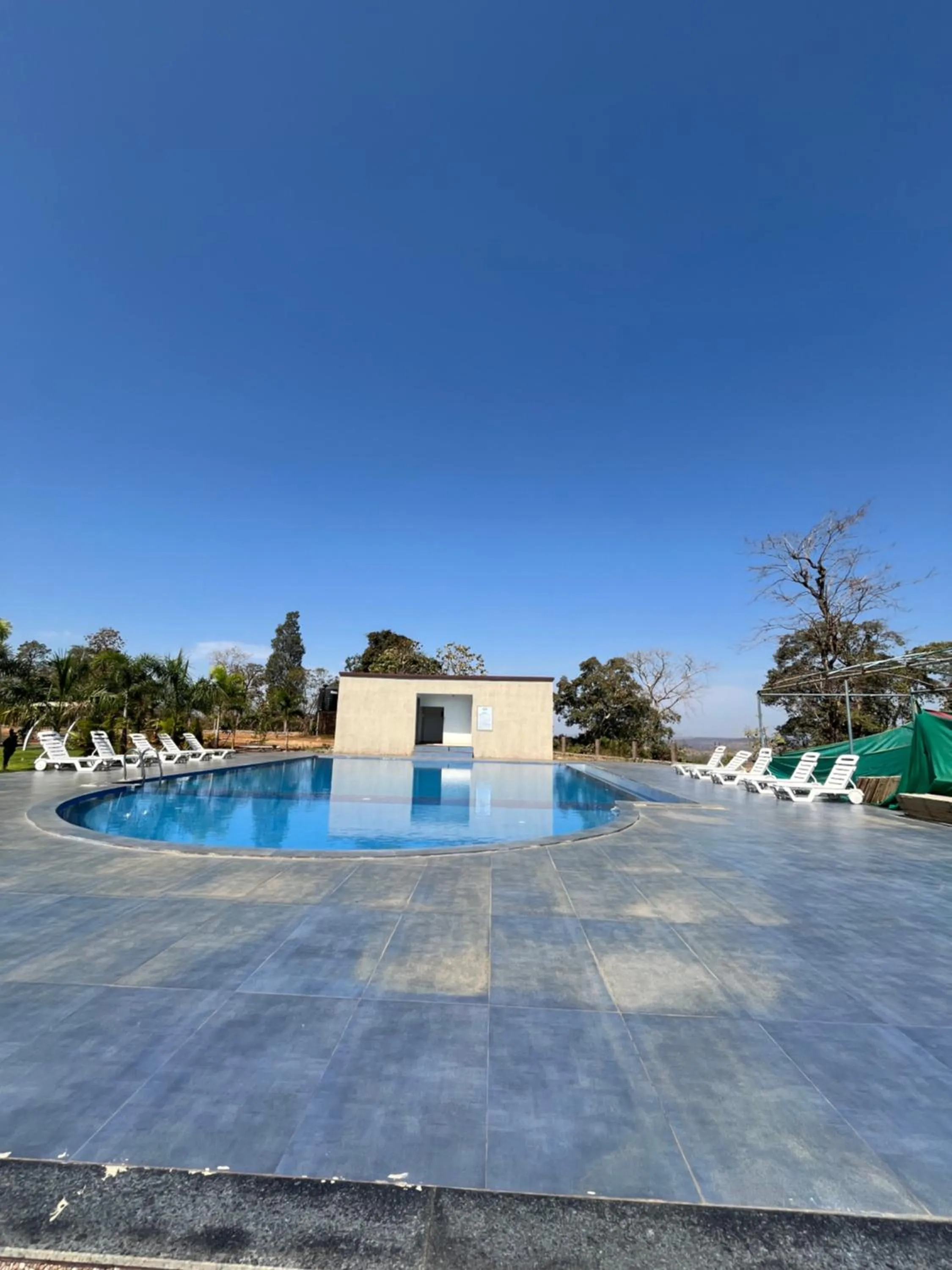 Swimming pool in Daksh The Valley Resort - Saputara