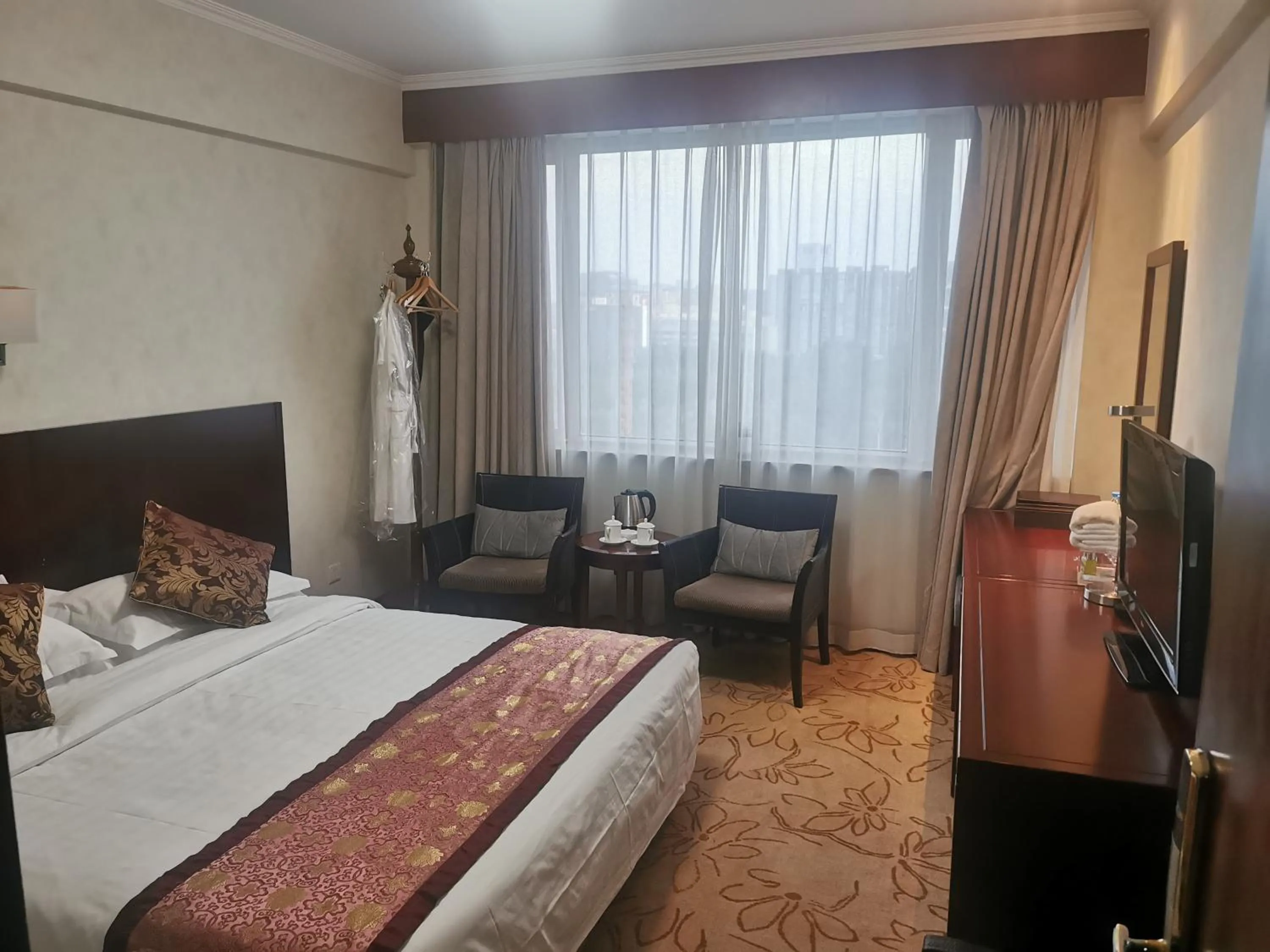 Bed in Beijing Shengli Hotel