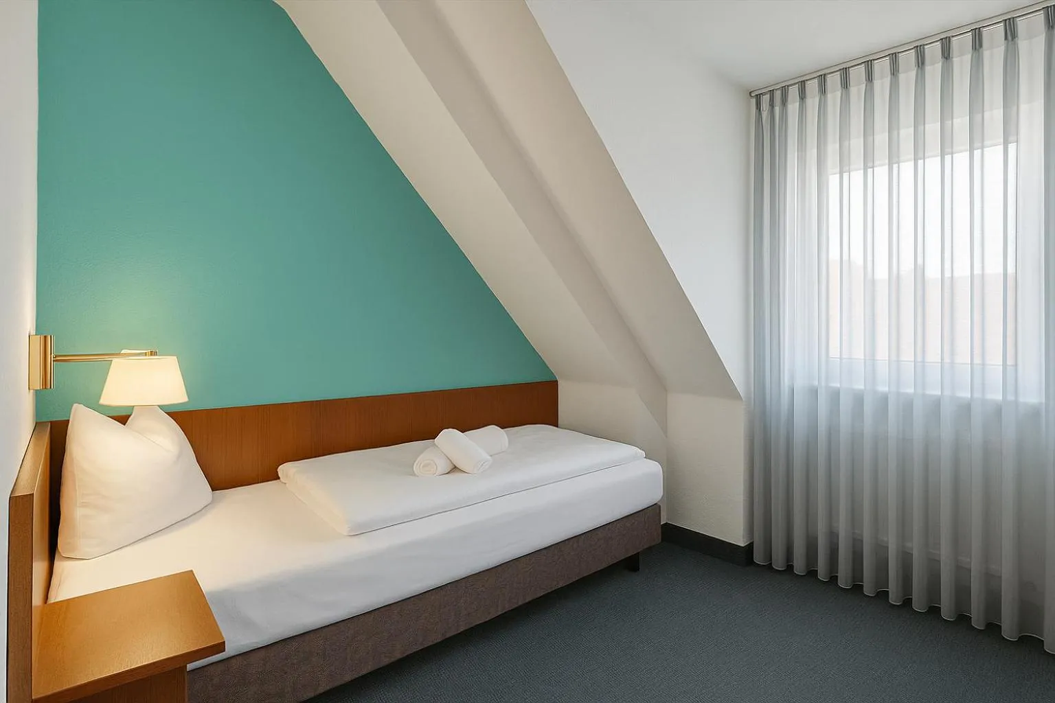 Bed in AR Boutique Hotel Mannheim