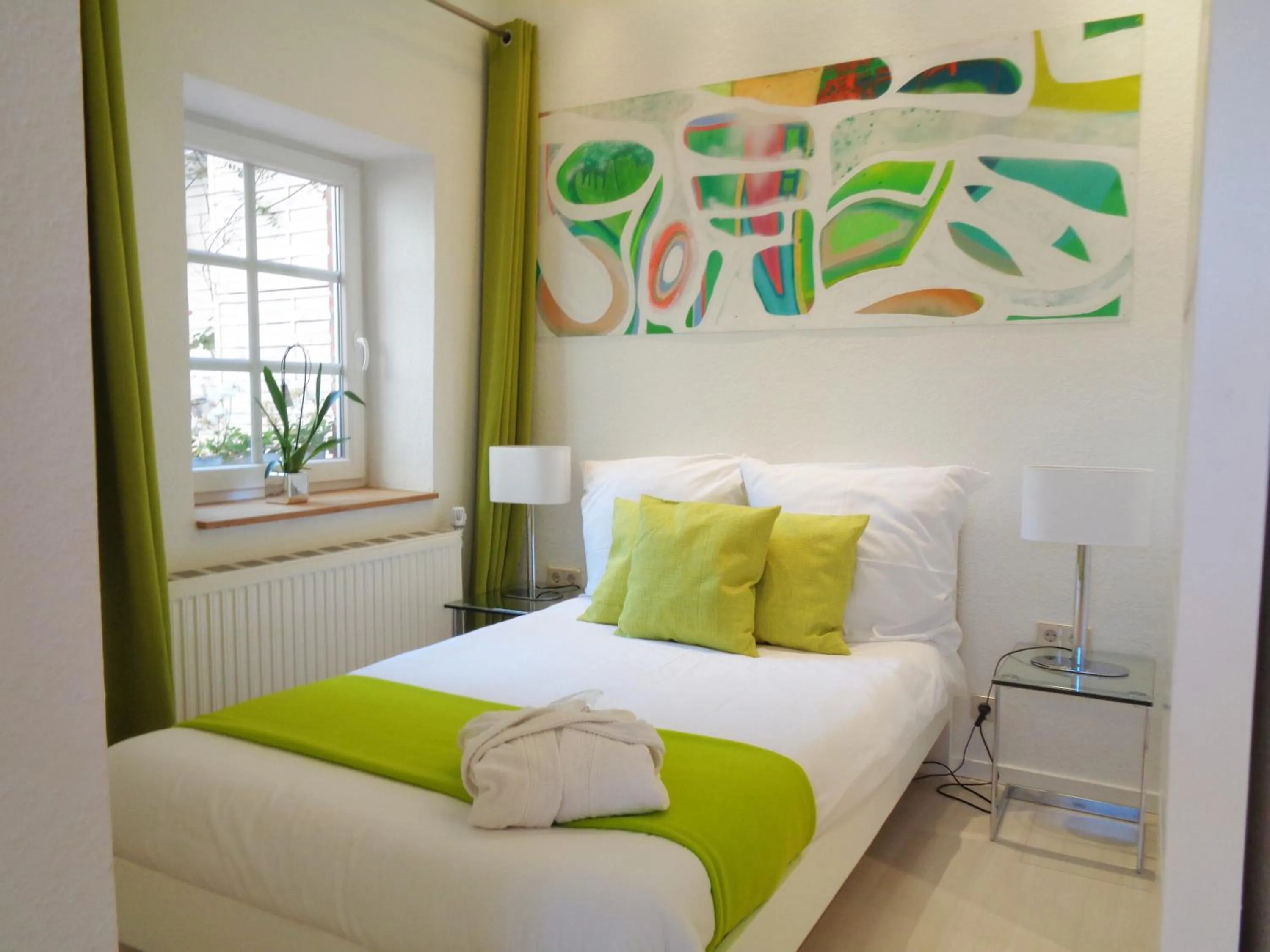 Bedroom, Bed in Hotel Apartment Puell