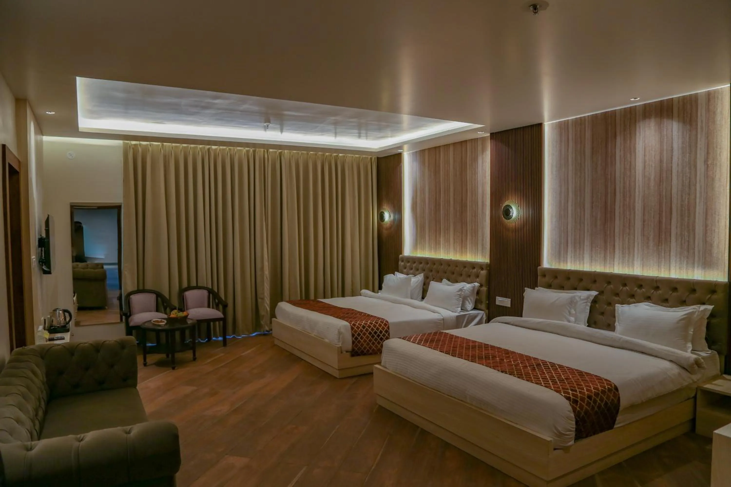 Bed in Four Leaf Hotel Arjuna Manor, Varanasi