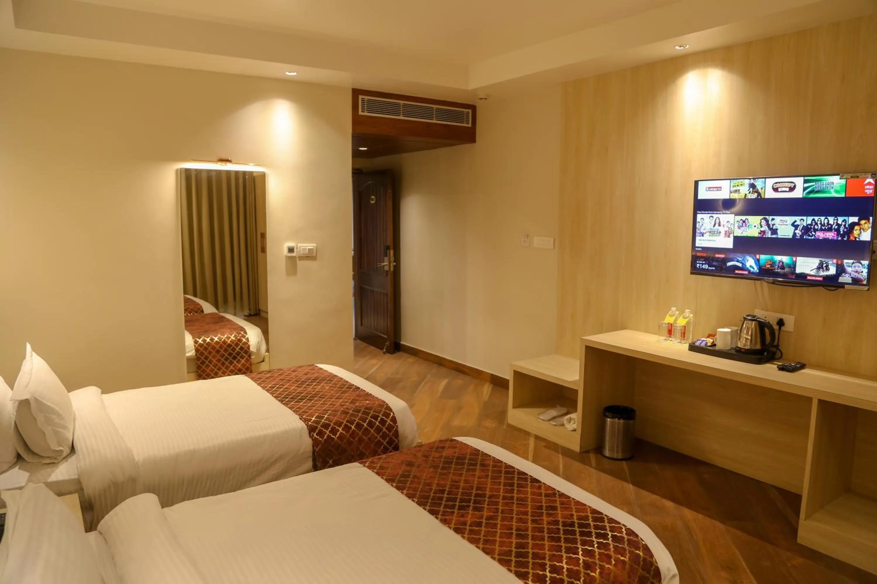 Bed in Four Leaf Hotel Arjuna Manor, Varanasi