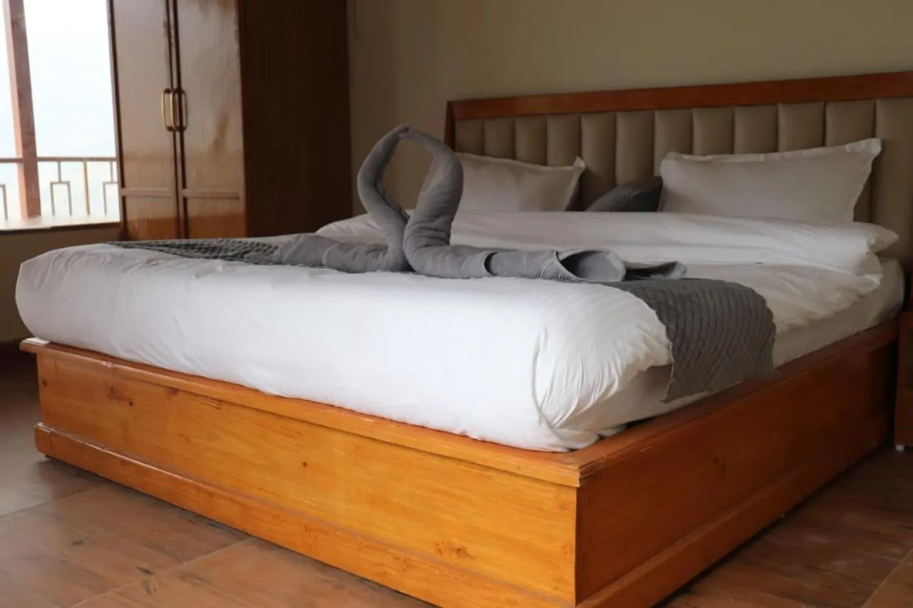 Bed in Chaukhamba view Resort