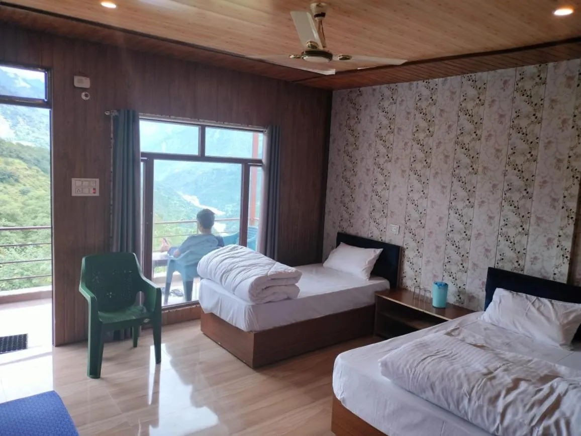 Bed in Chaukhamba view Resort