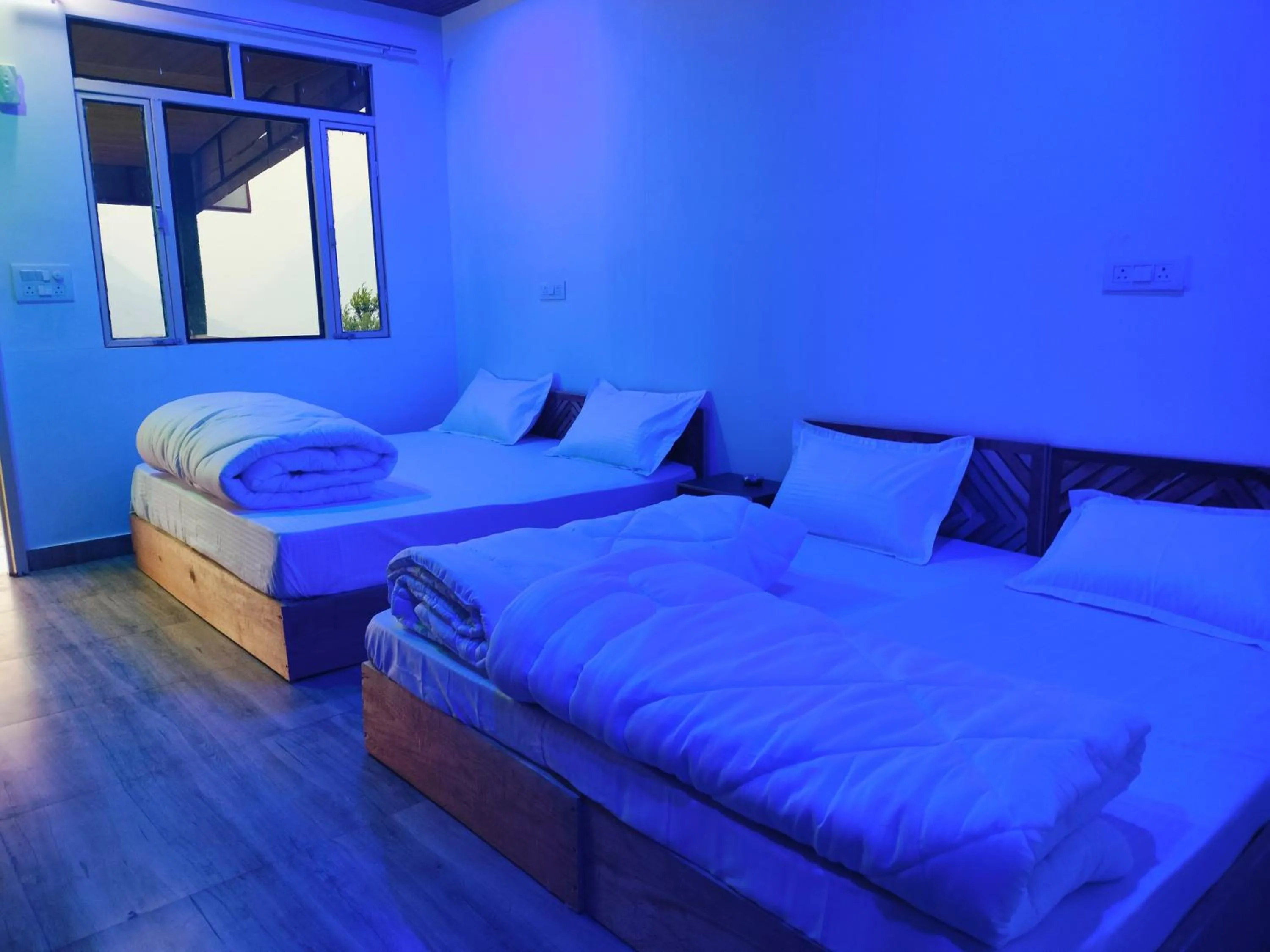 Bed in Chaukhamba view Resort