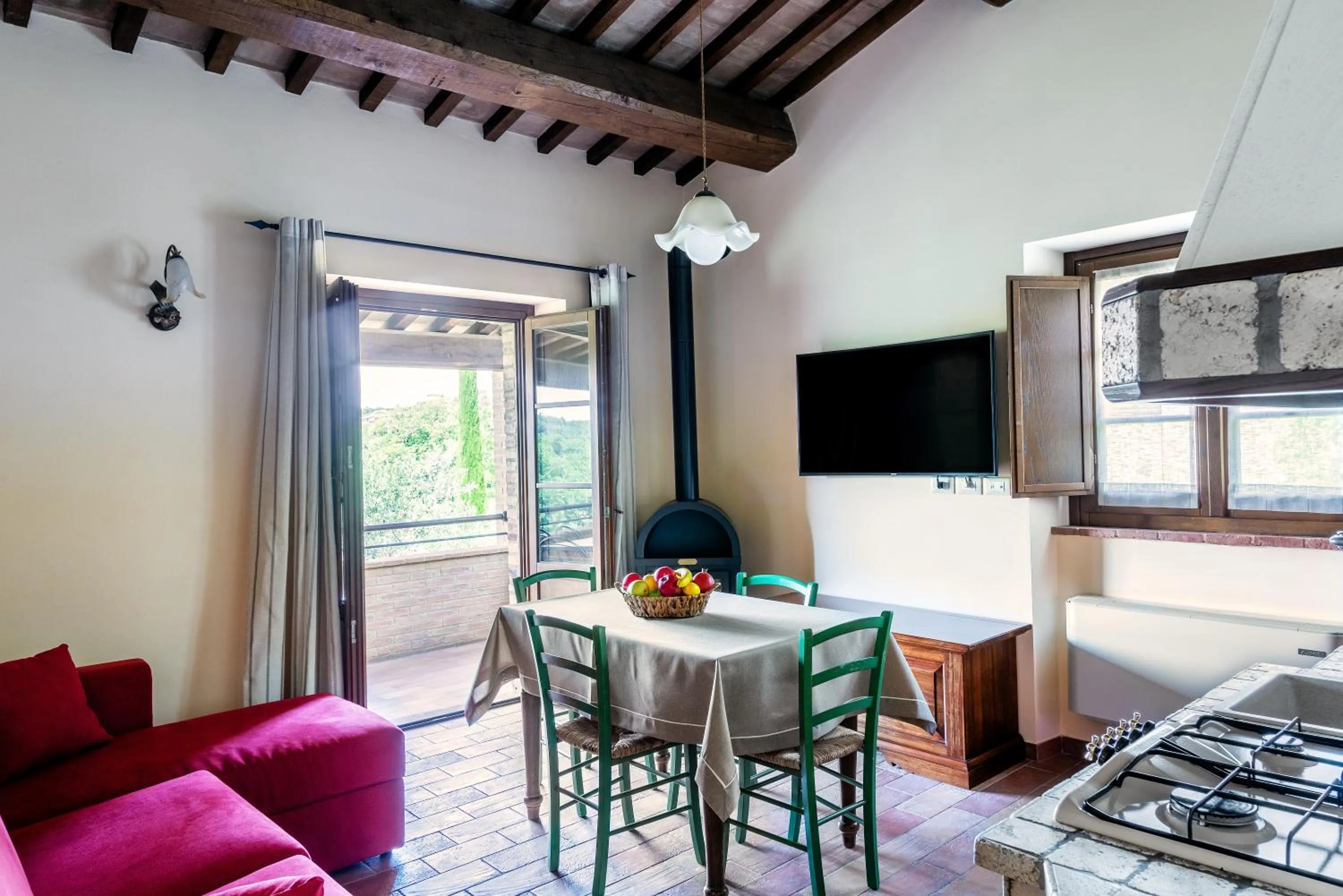 Communal lounge/ TV room in PanElios Borgo Vacanze