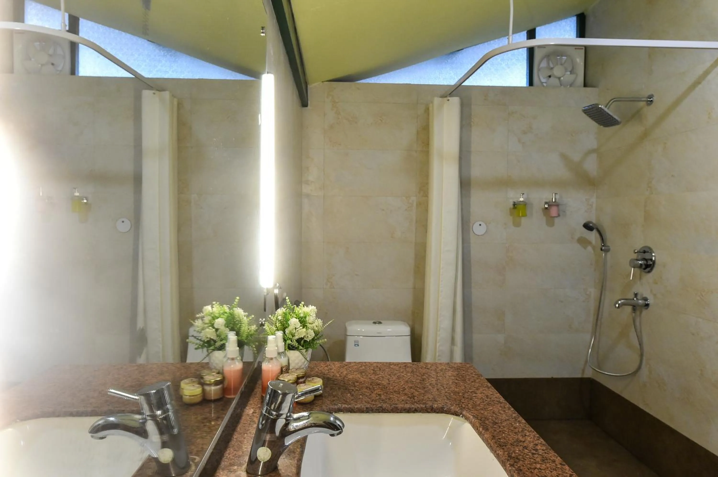 Shower in Sukoon - A Wellness Resort and Spa