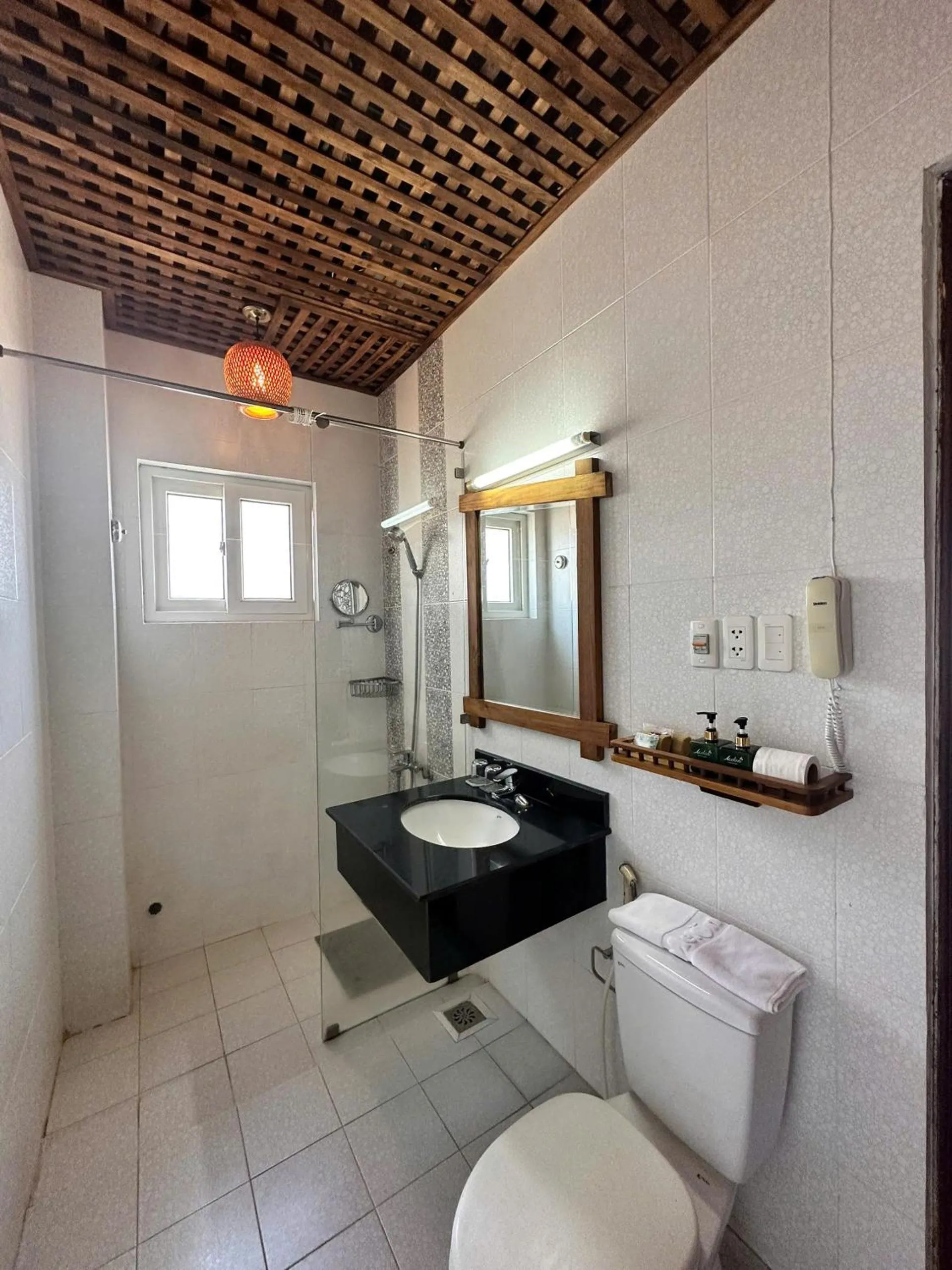 Shower in Melon Resort & Pickleball Club Mũi Né