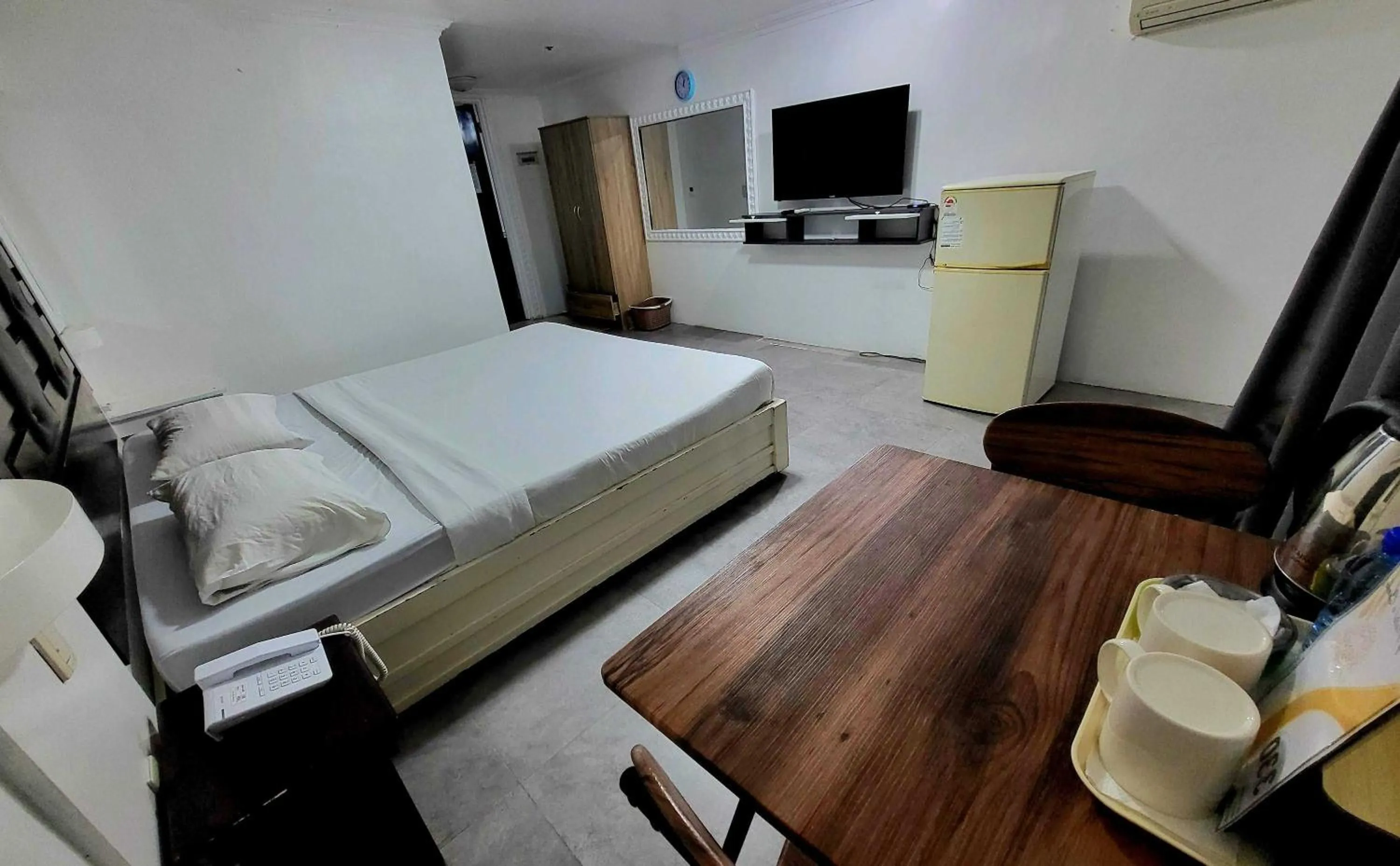 Bed in OYO 1141 Healing Condo Hotel