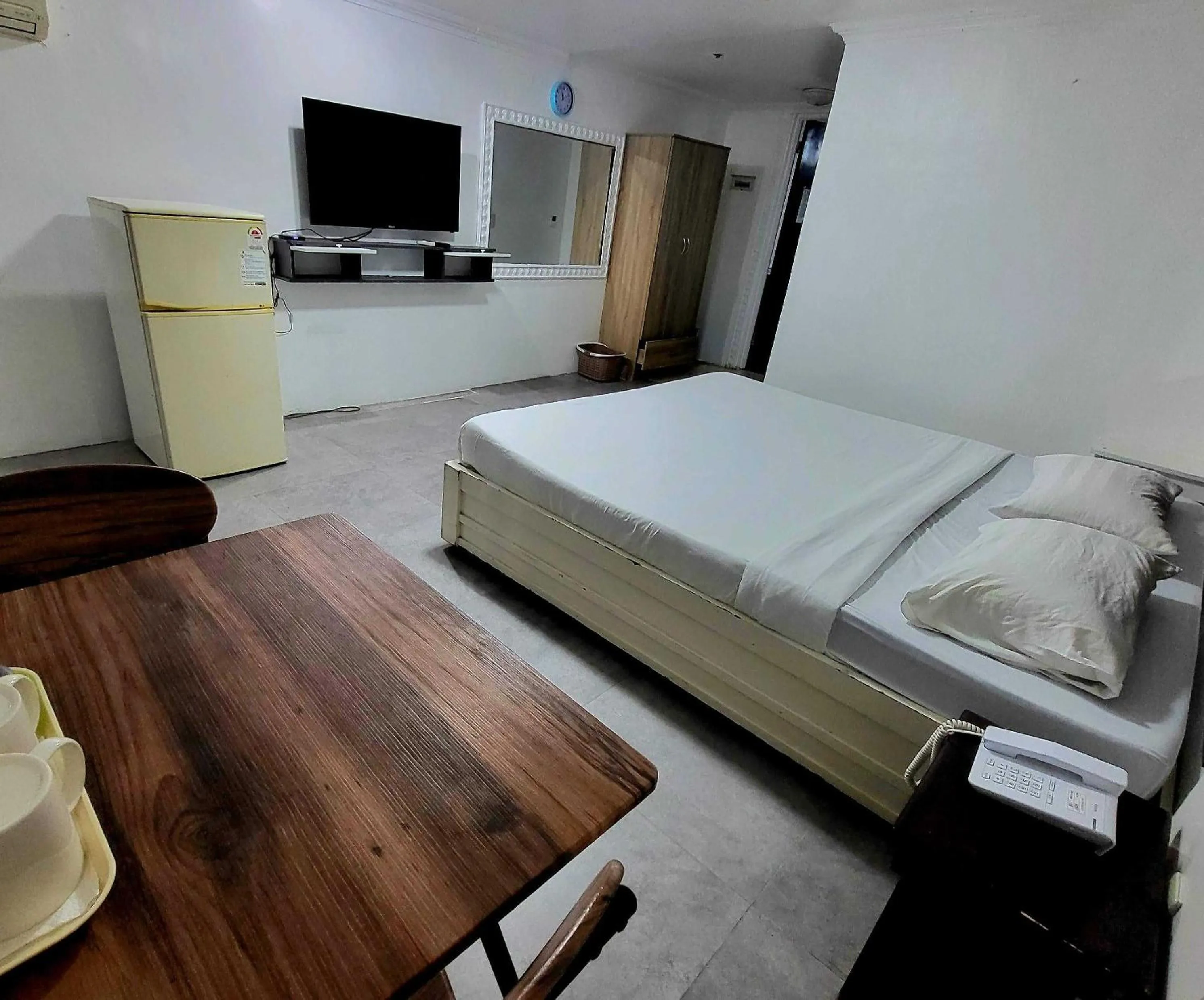 Bed in OYO 1141 Healing Condo Hotel