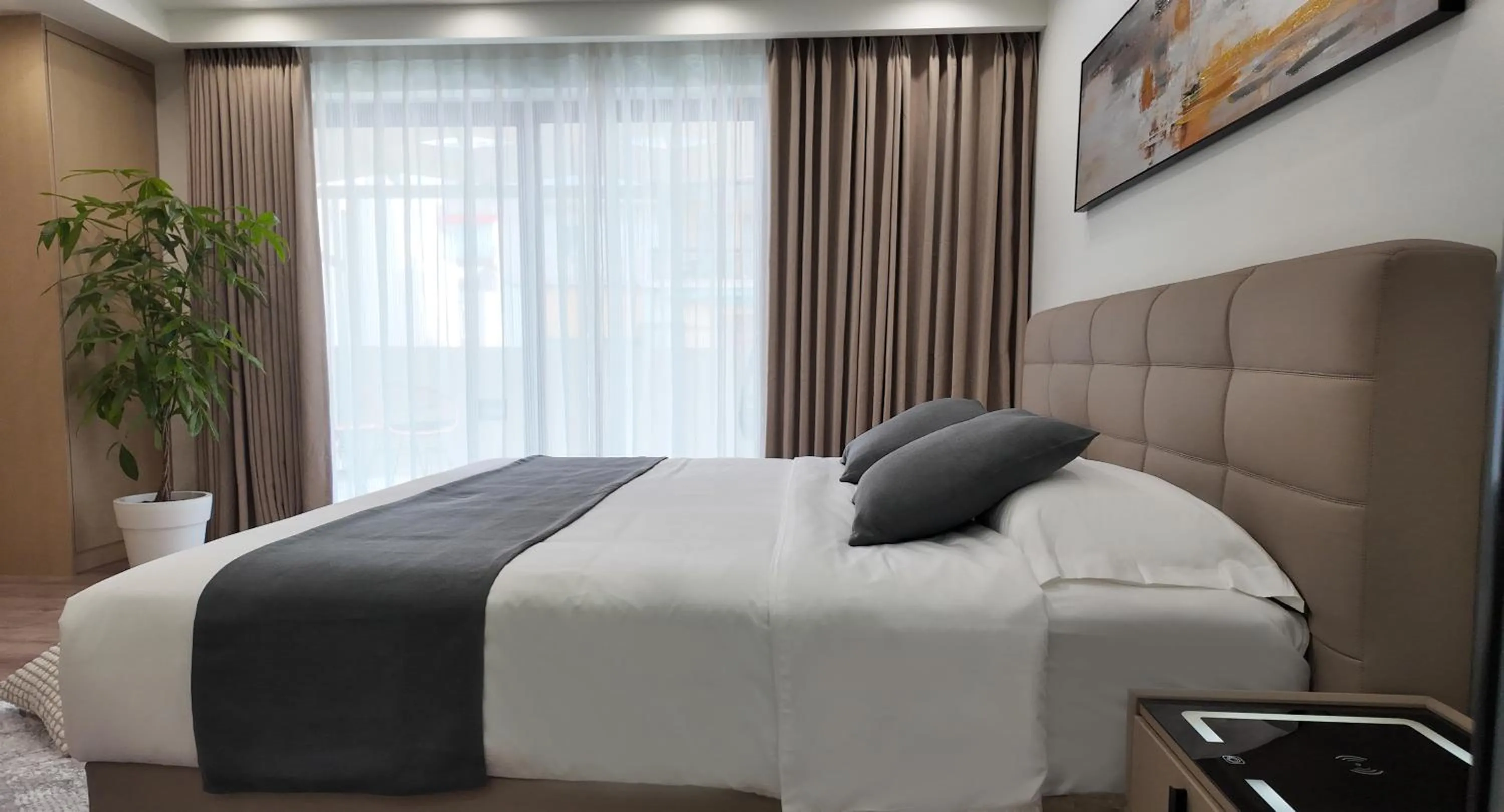 Bed in CC LUX Suites in Piraeus Port