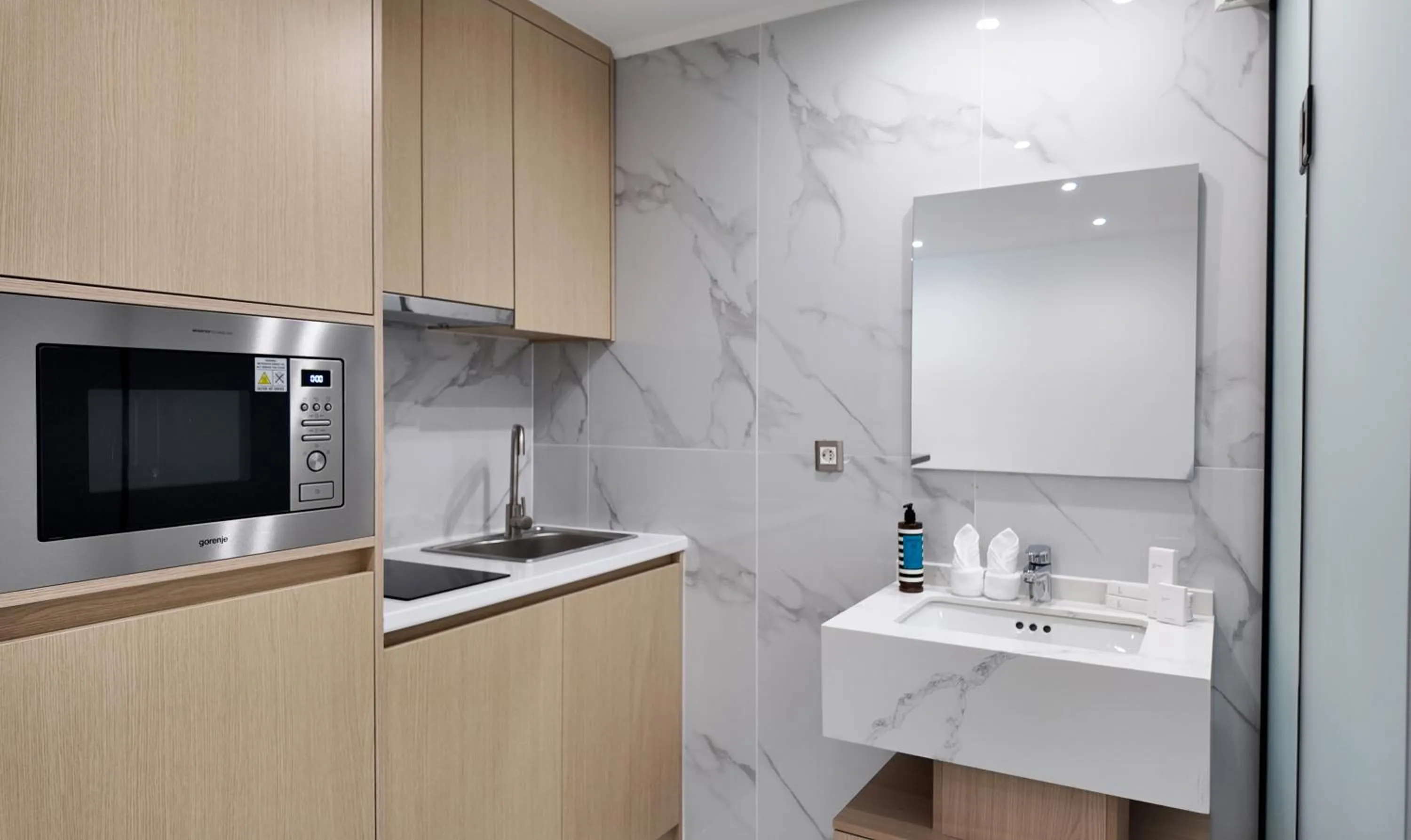 Kitchen or kitchenette in CC LUX Suites in Piraeus Port