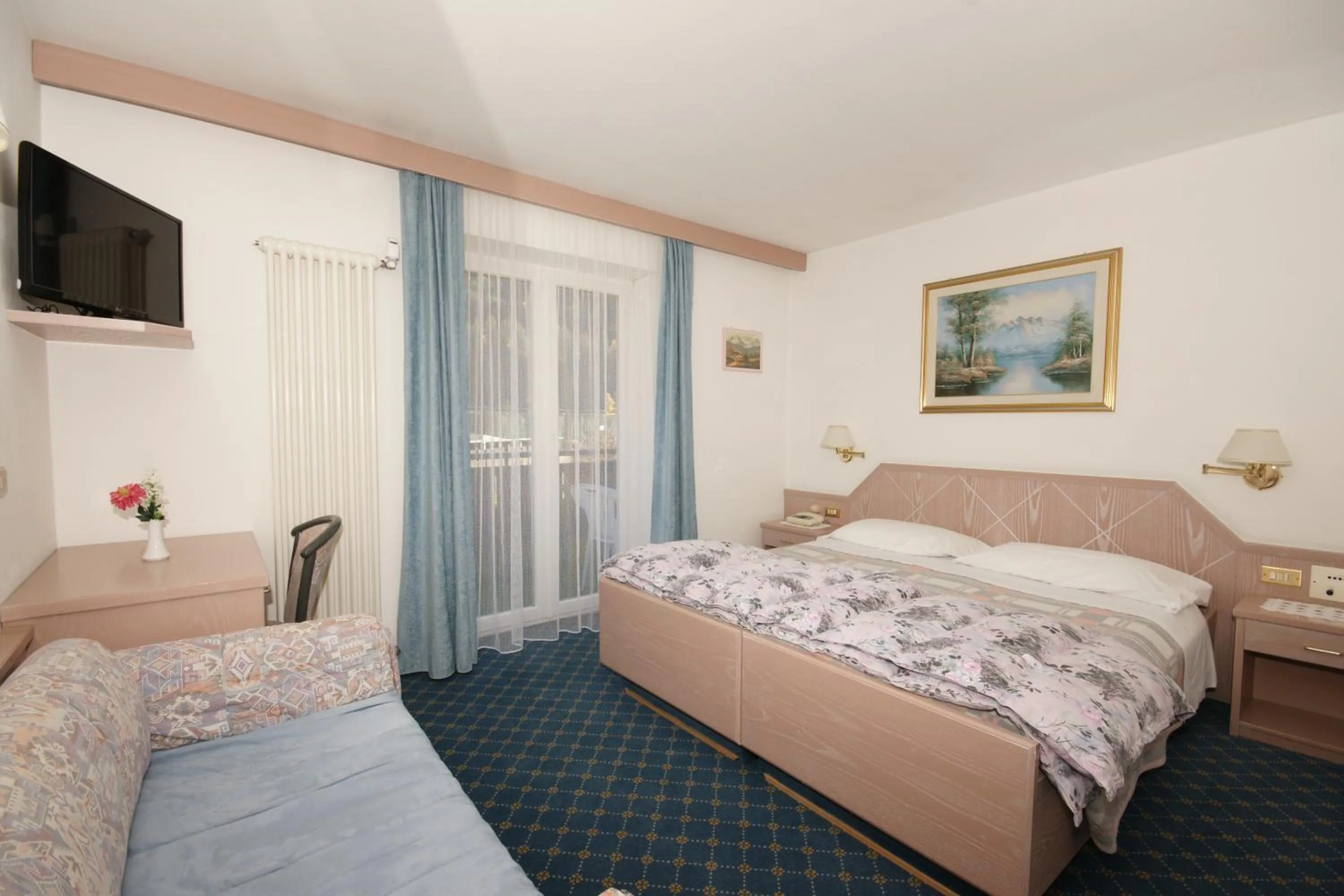 Bed in Hotel Villa Mozart