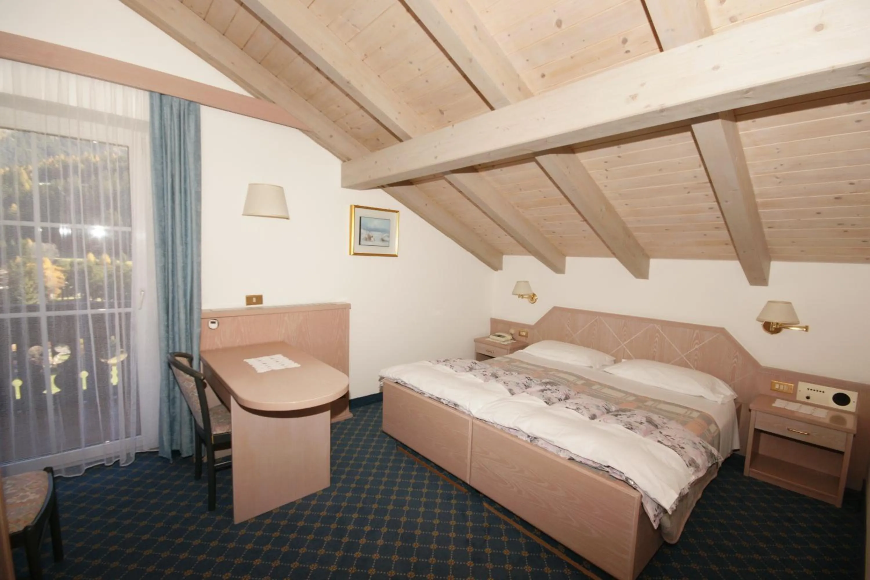 Bed in Hotel Villa Mozart