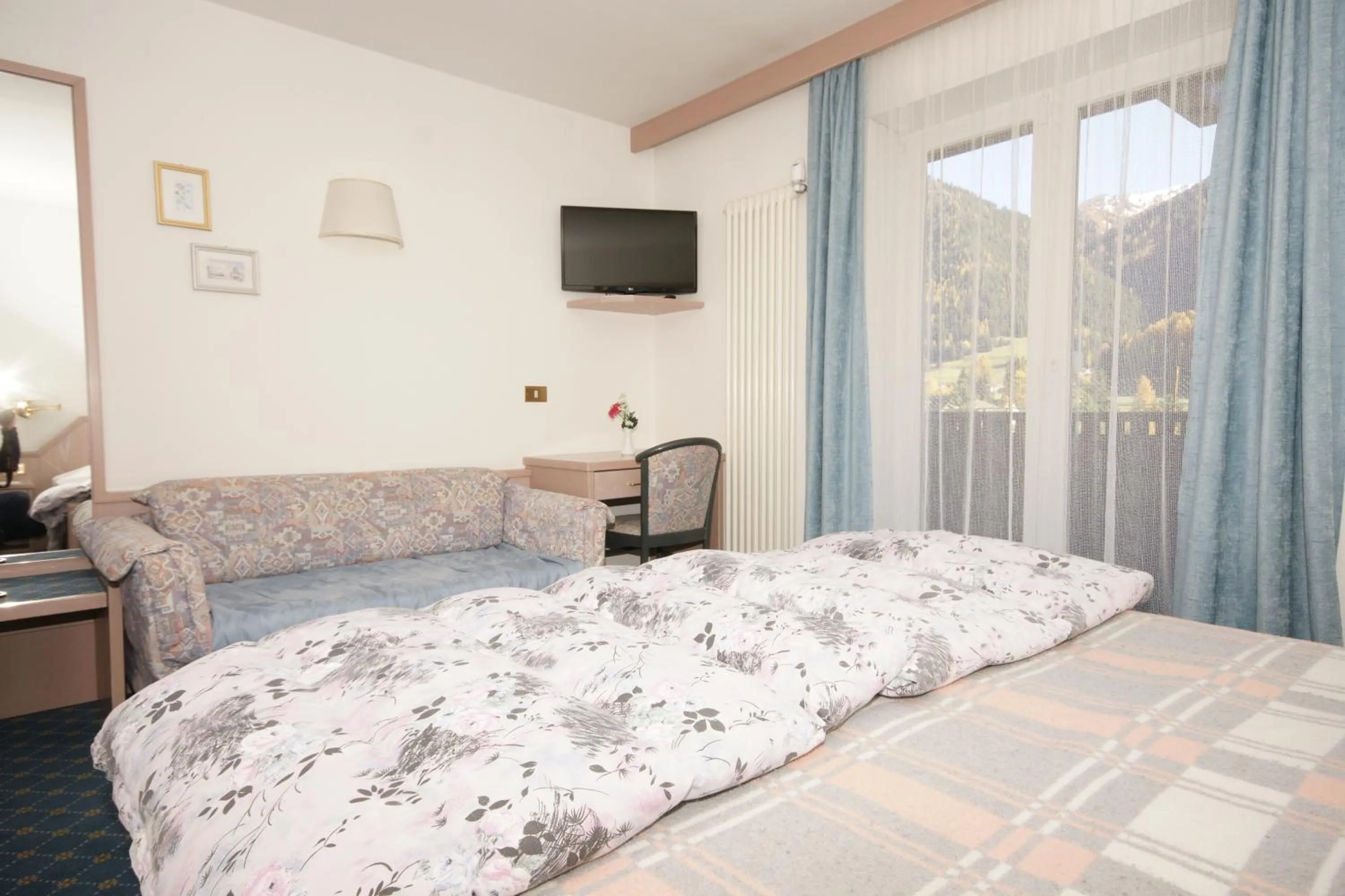 Bed in Hotel Villa Mozart