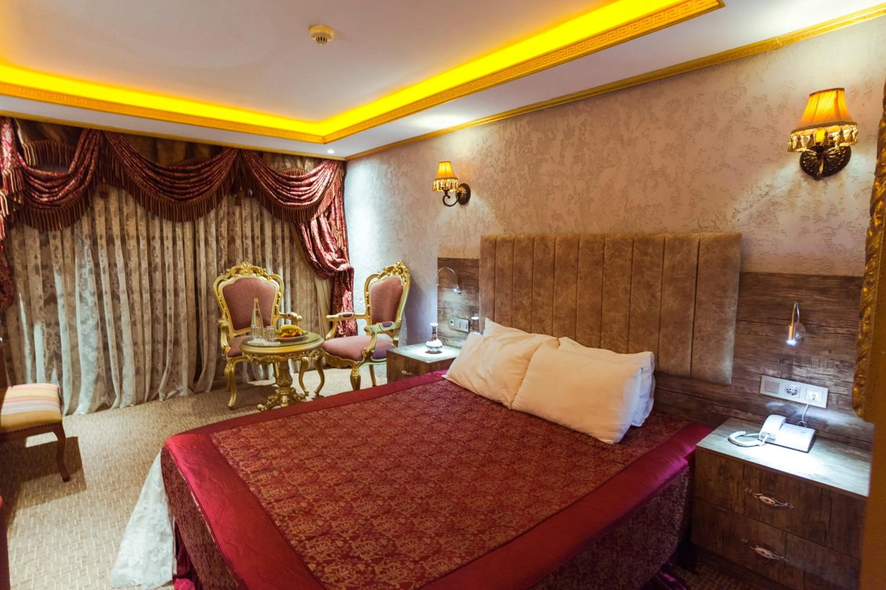 Photo of the whole room, Bed in Grand Ambiance Hotel