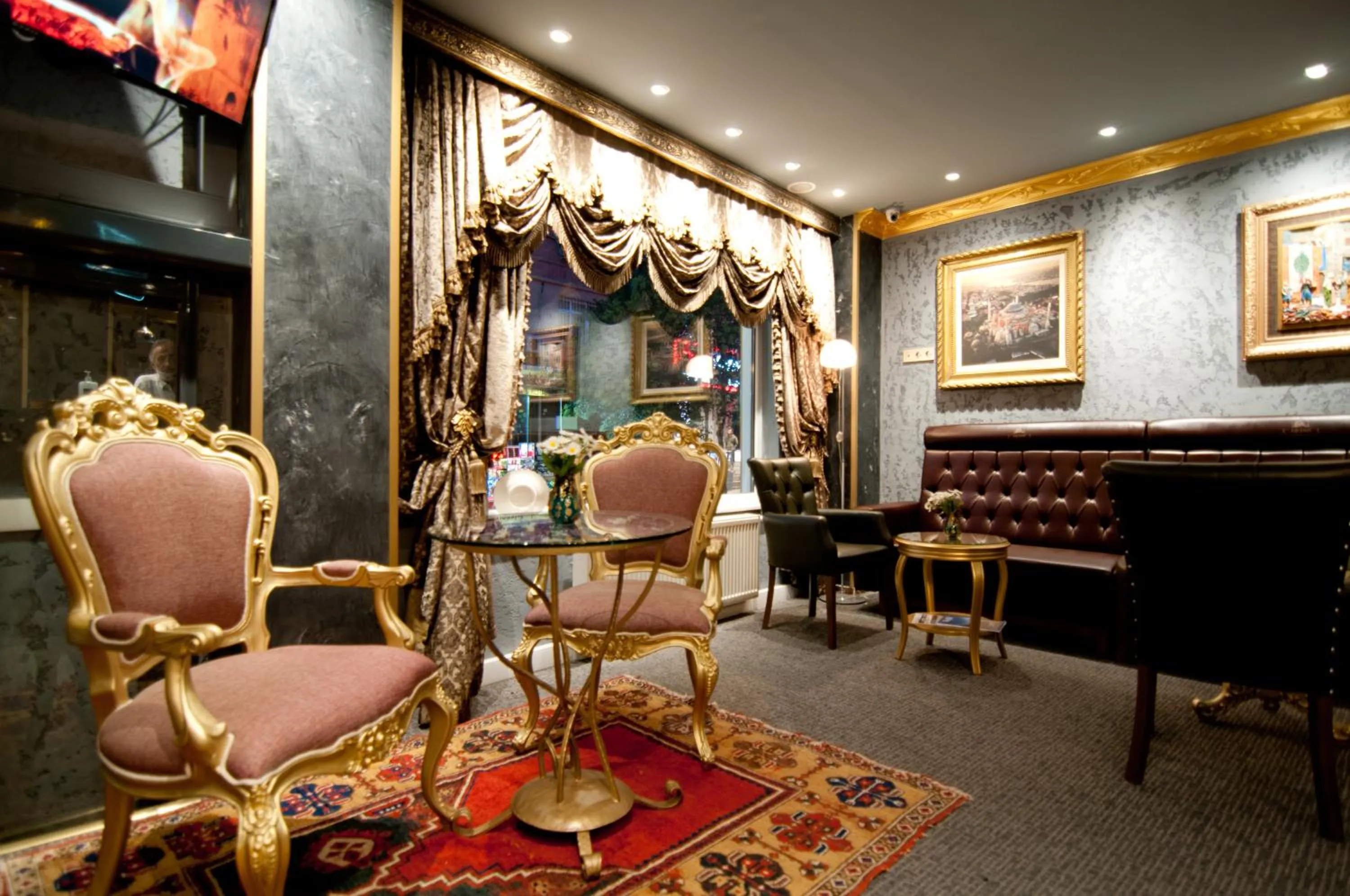 Lobby or reception in Grand Ambiance Hotel