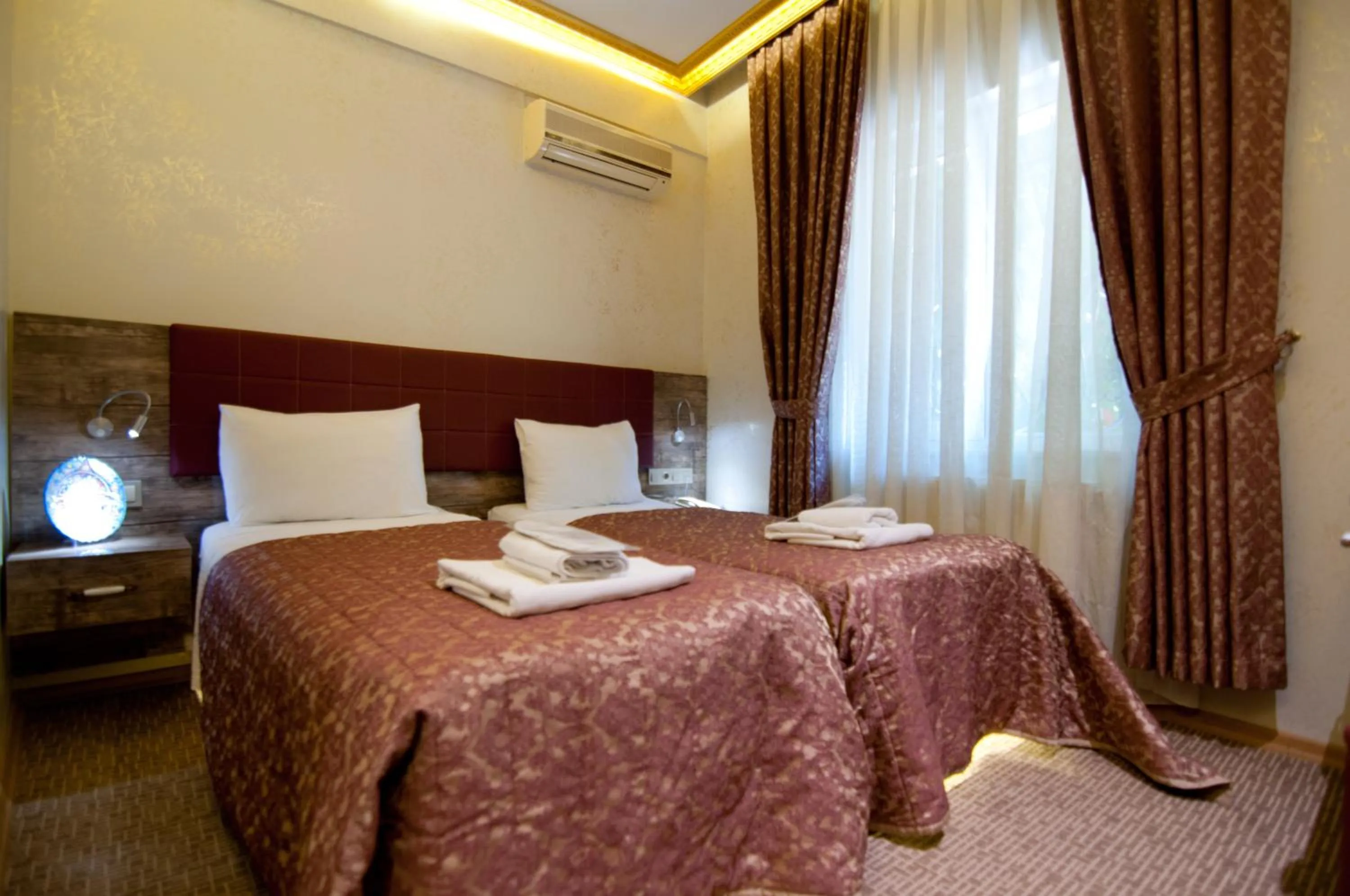Bedroom, Bed in Grand Ambiance Hotel
