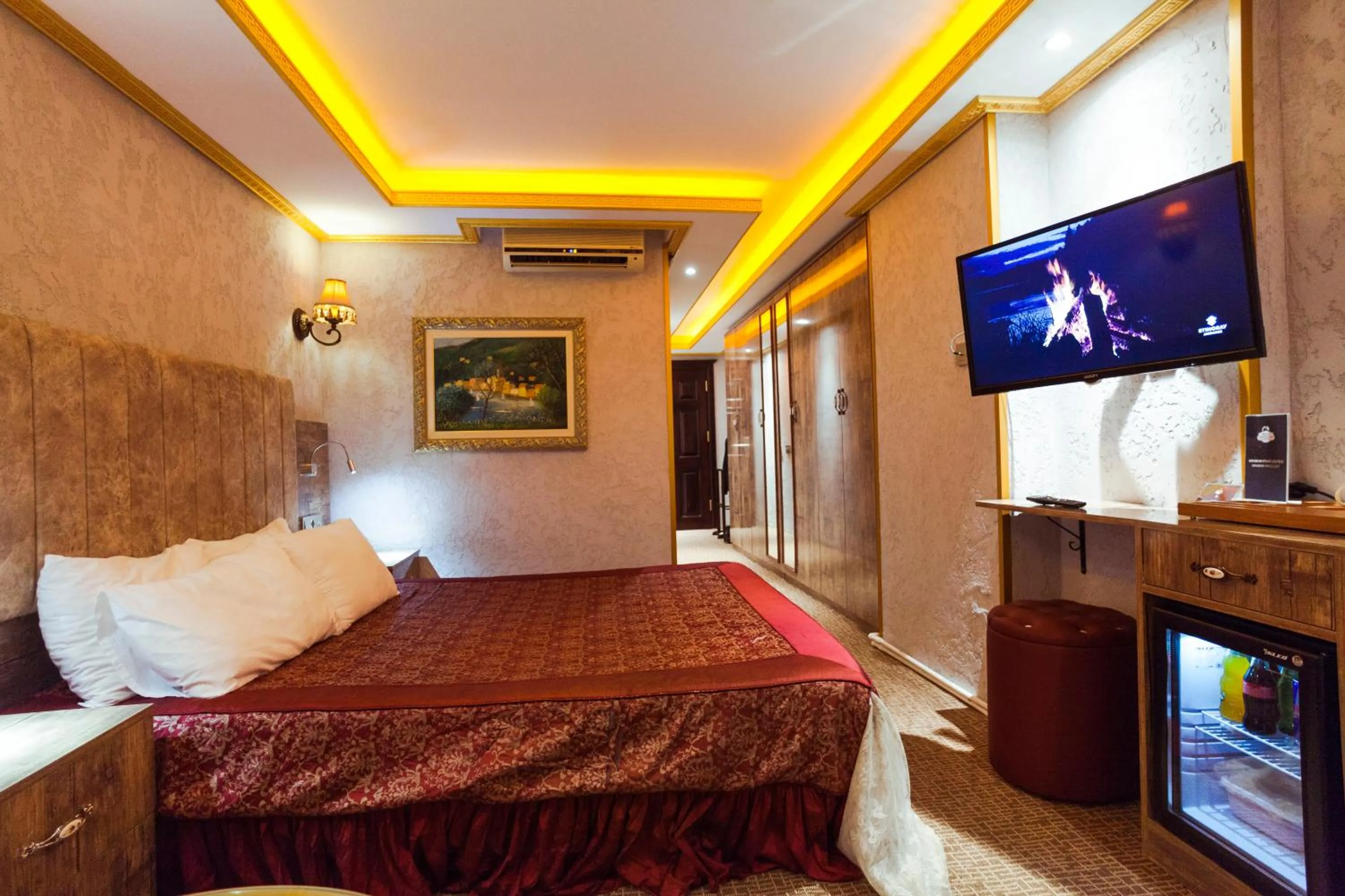 Photo of the whole room, Bed in Grand Ambiance Hotel