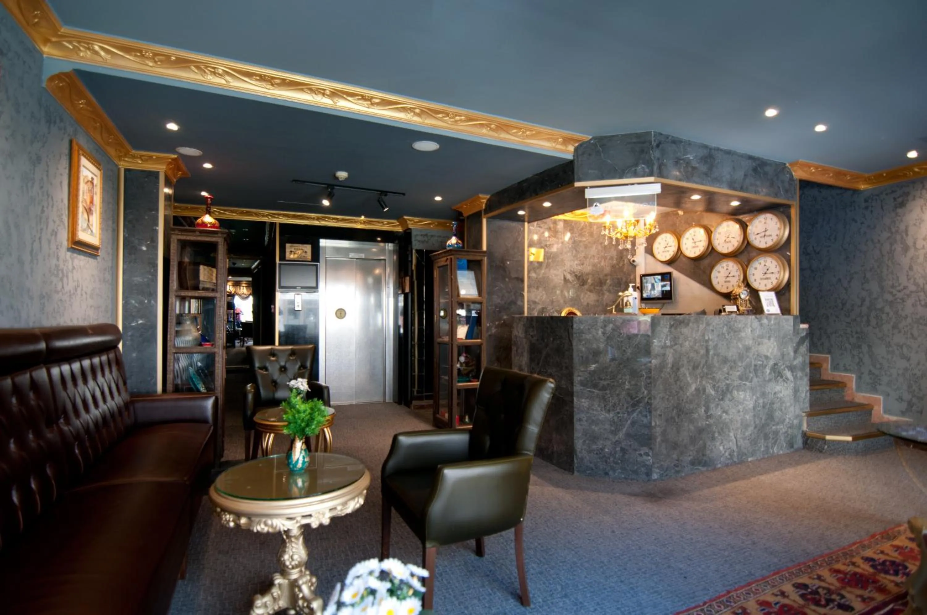 Lobby or reception in Grand Ambiance Hotel