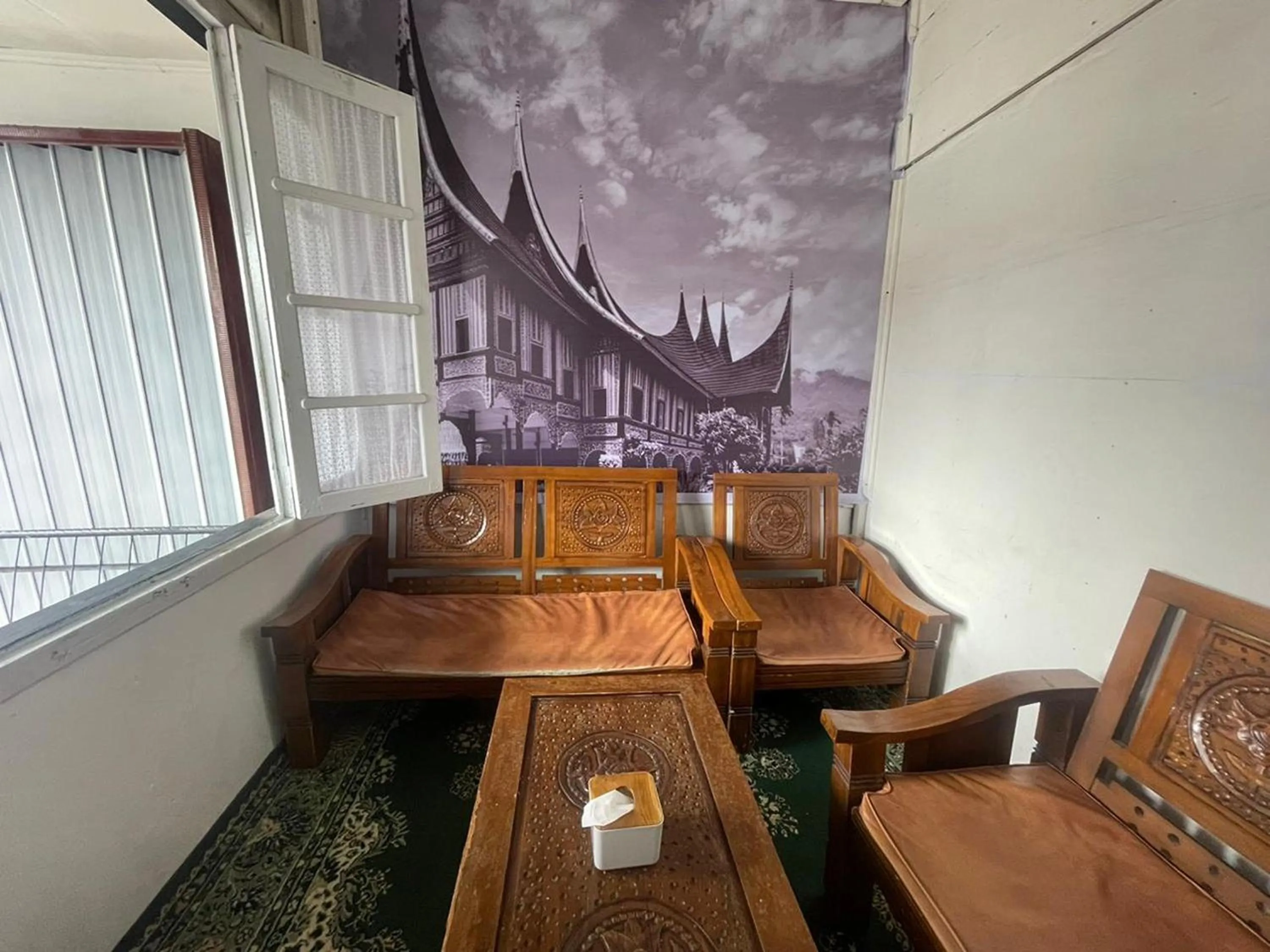 Seating area in Villa Palacios Syari'ah Bukittinggi