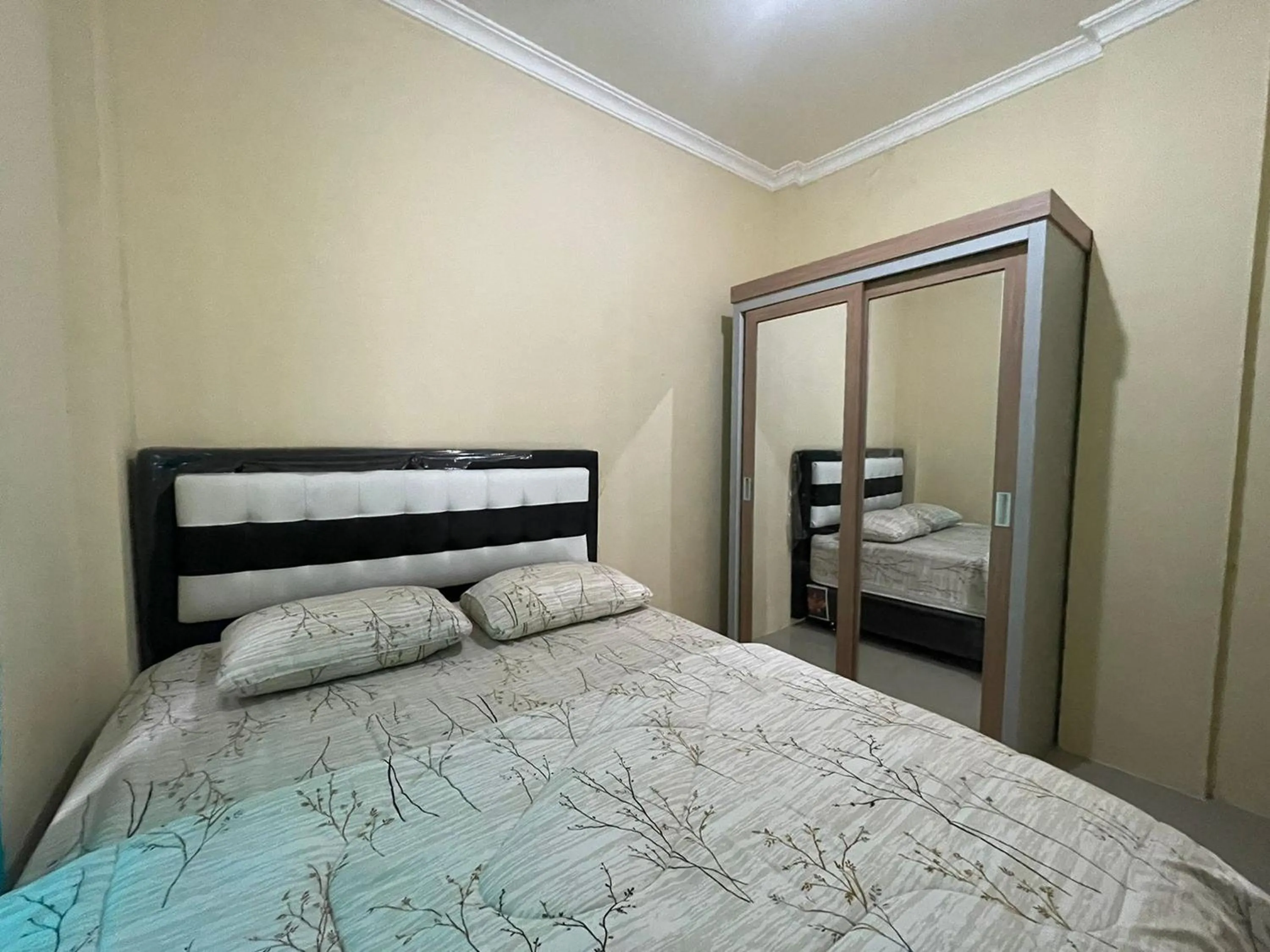 Bed in Villa Palacios Syari'ah Bukittinggi