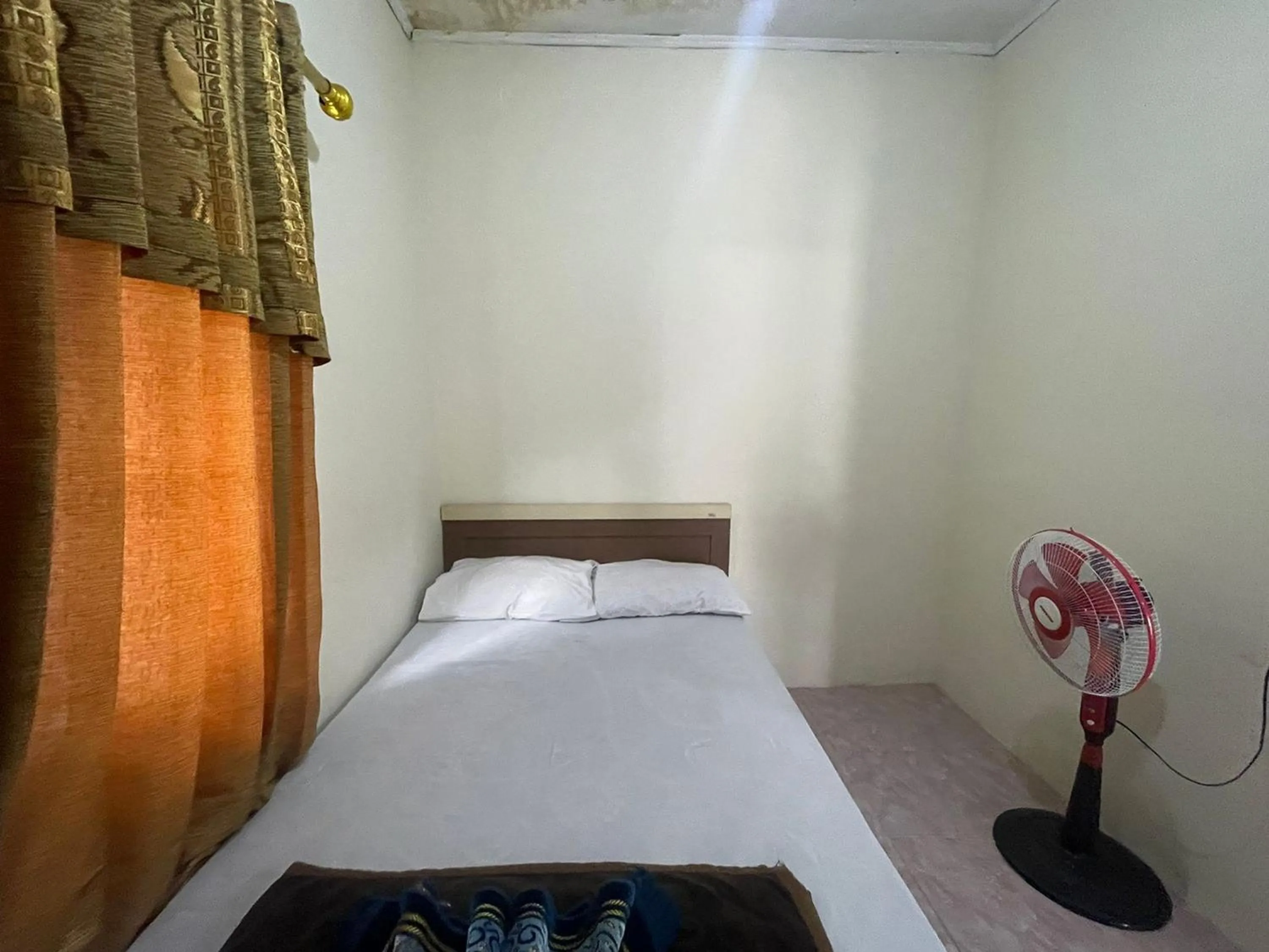 Bed in Villa Palacios Syari'ah Bukittinggi