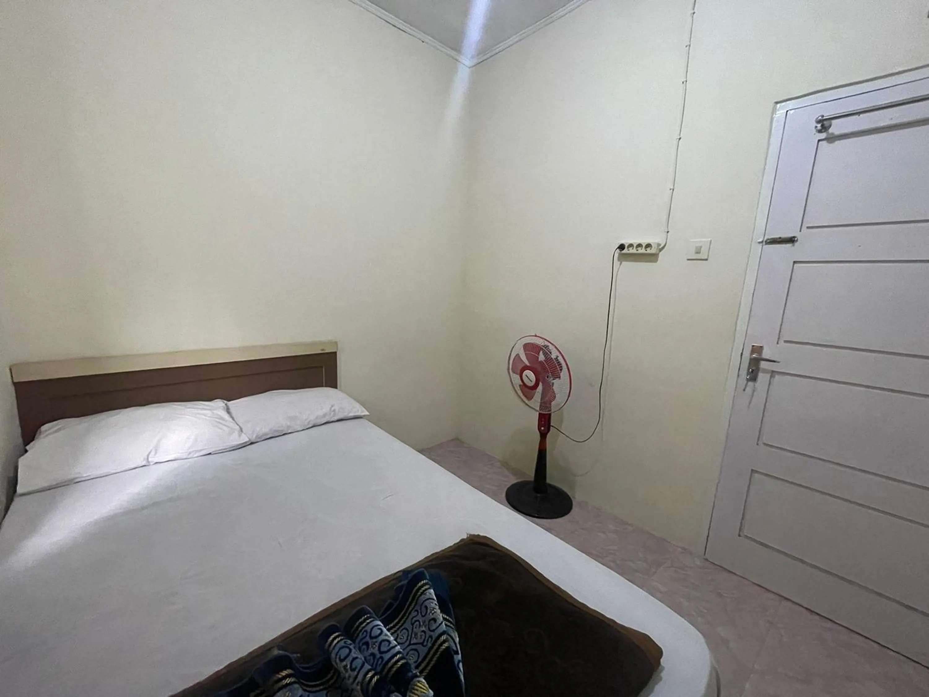 Bed in Villa Palacios Syari'ah Bukittinggi