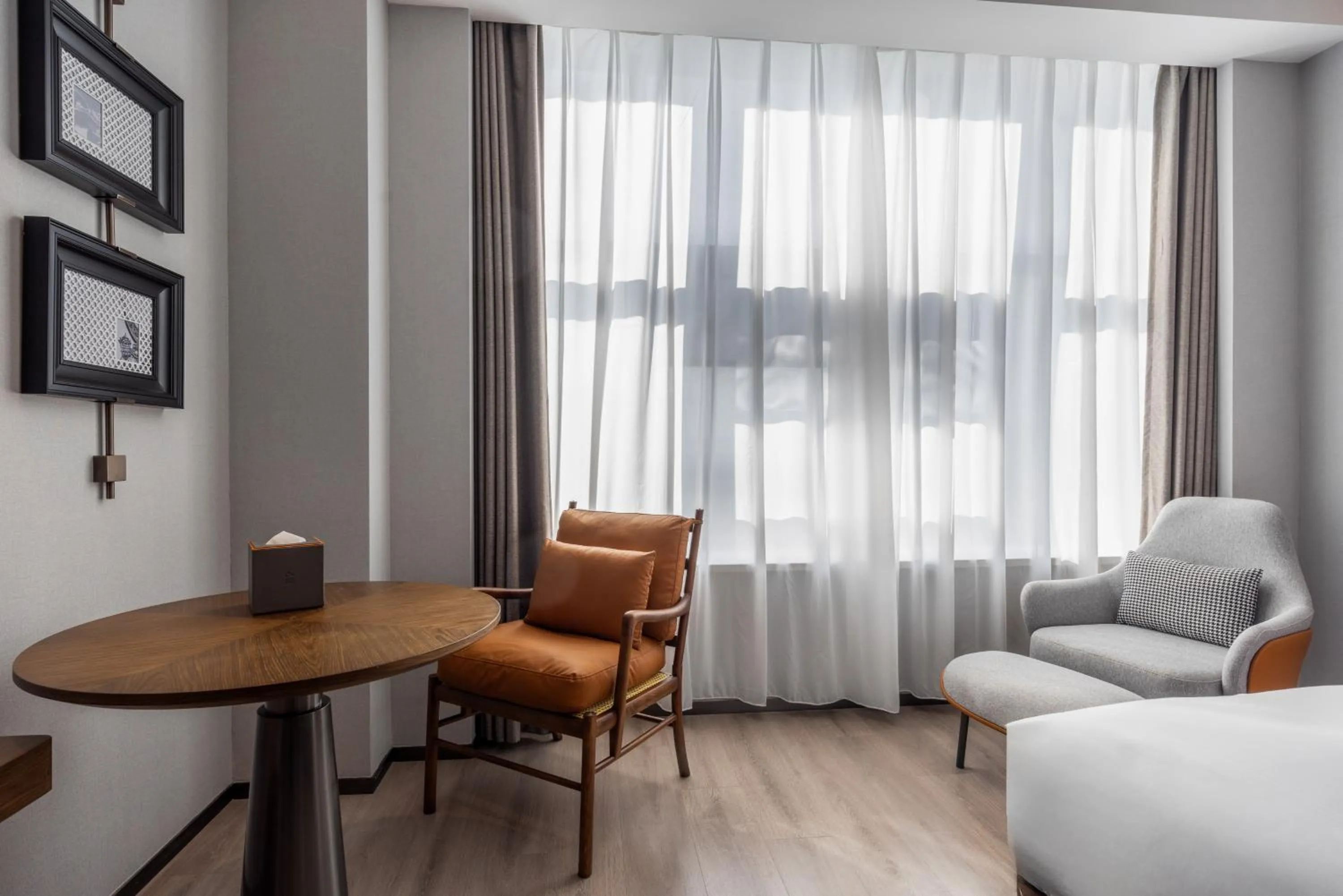 Seating area in UrCove By Hyatt Guangzhou Baiyun Airport