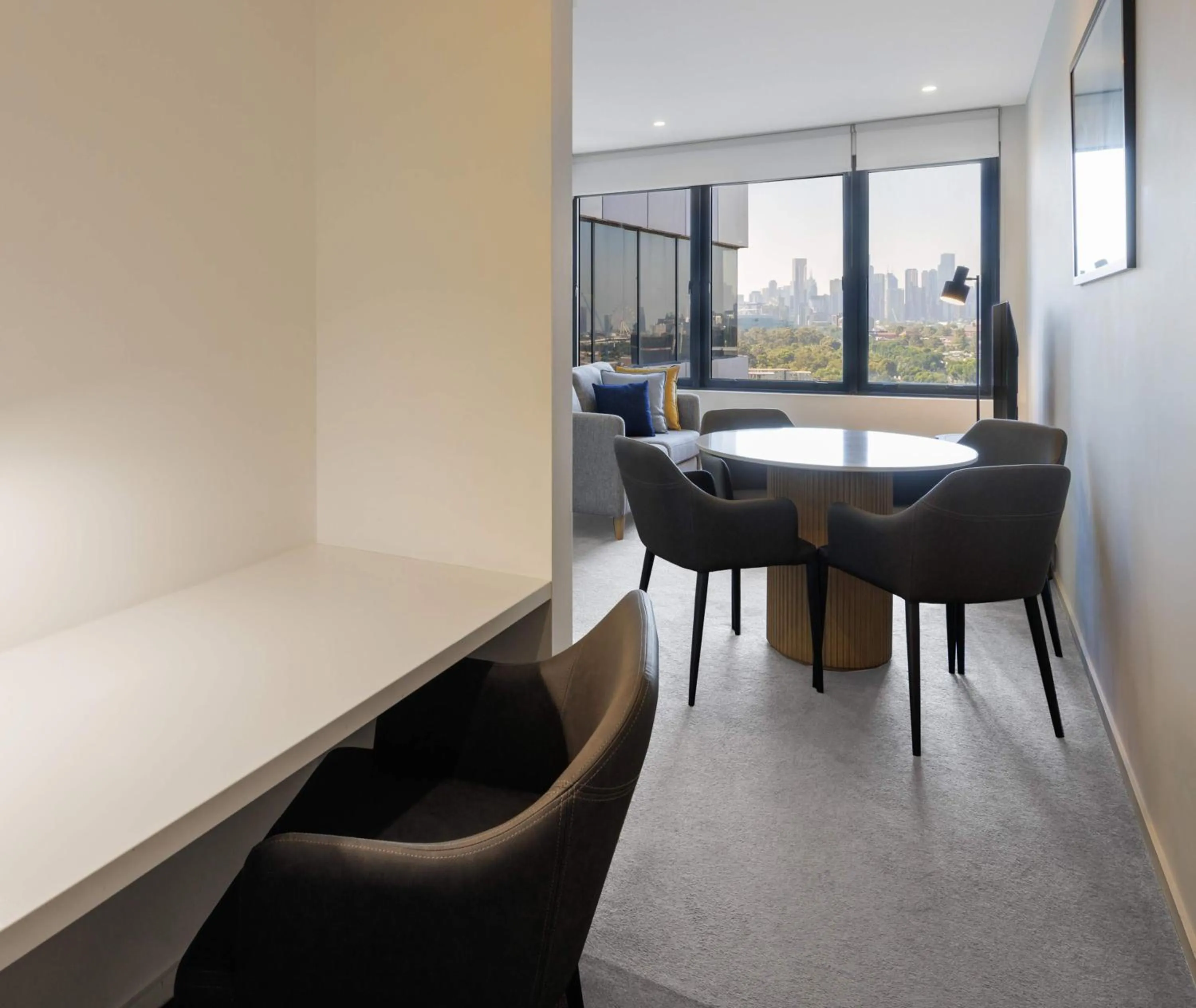 Seating area in Oaks Melbourne Flemington Suites