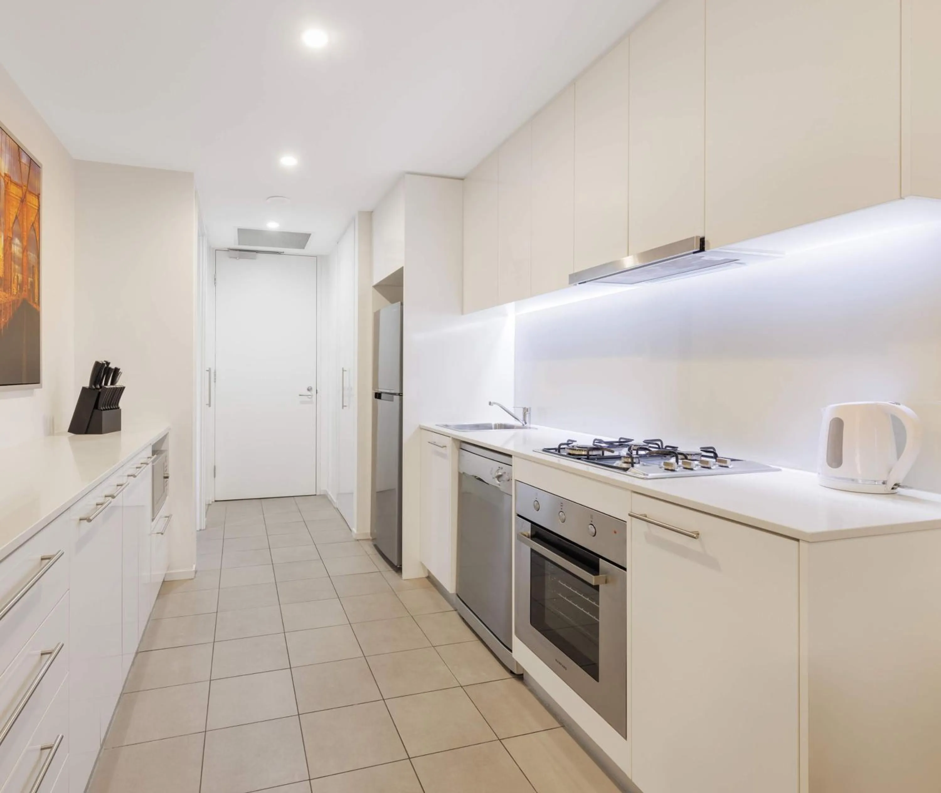 Kitchen or kitchenette in Oaks Melbourne Flemington Suites