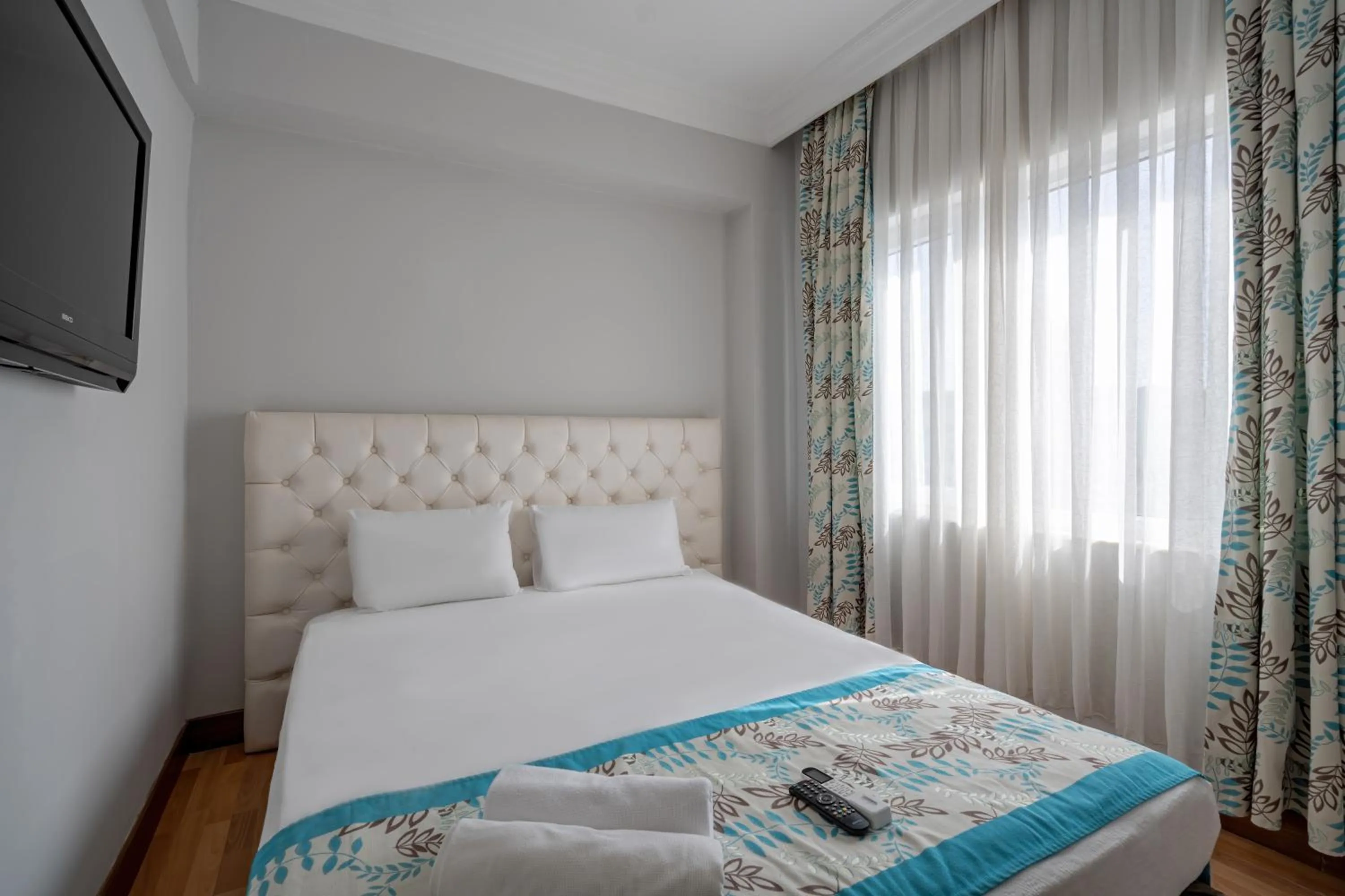 Bed in Side Nusso Beach Club - All Inclusive